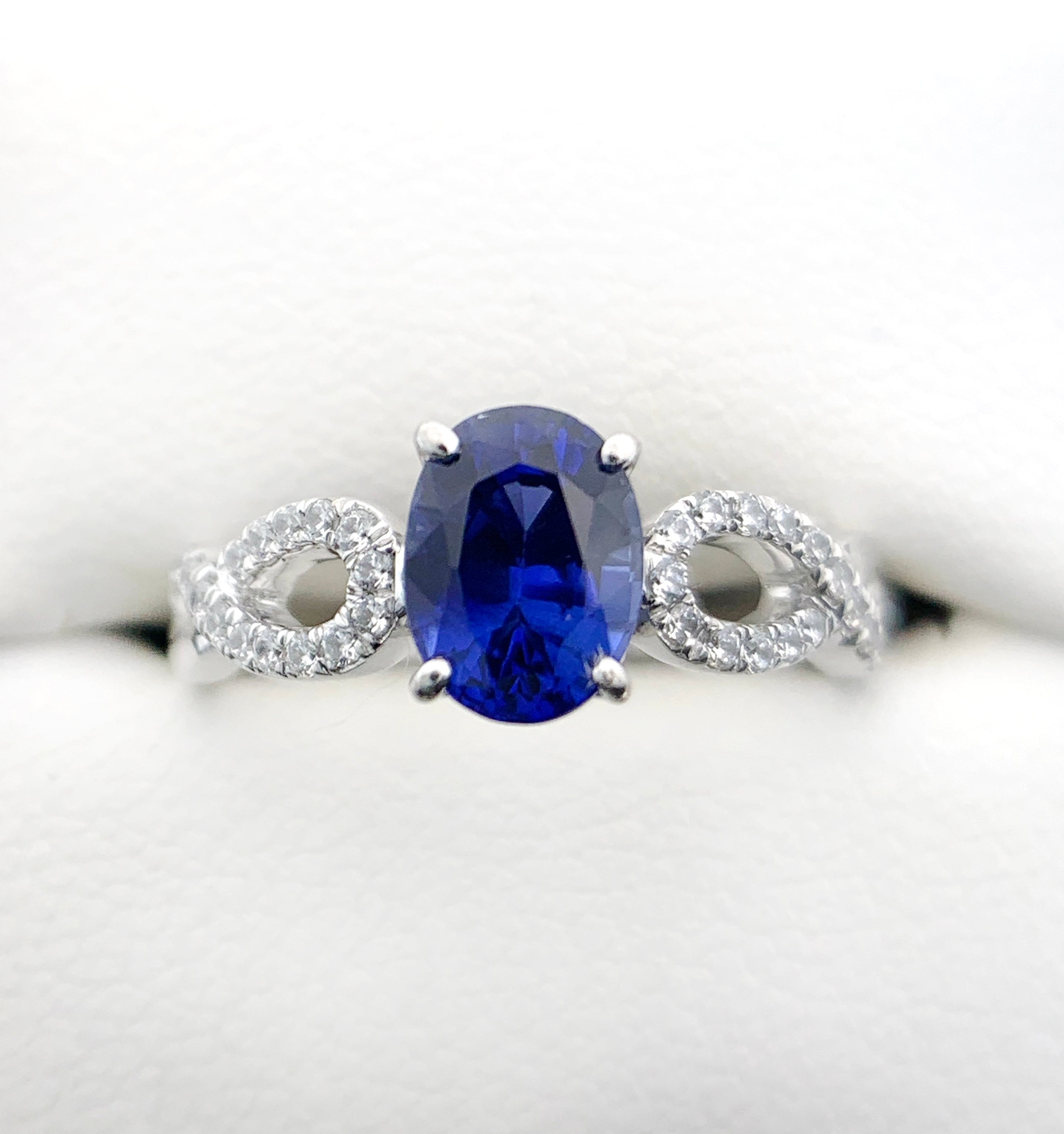 Natural blue sapphire engagement ring in white gold