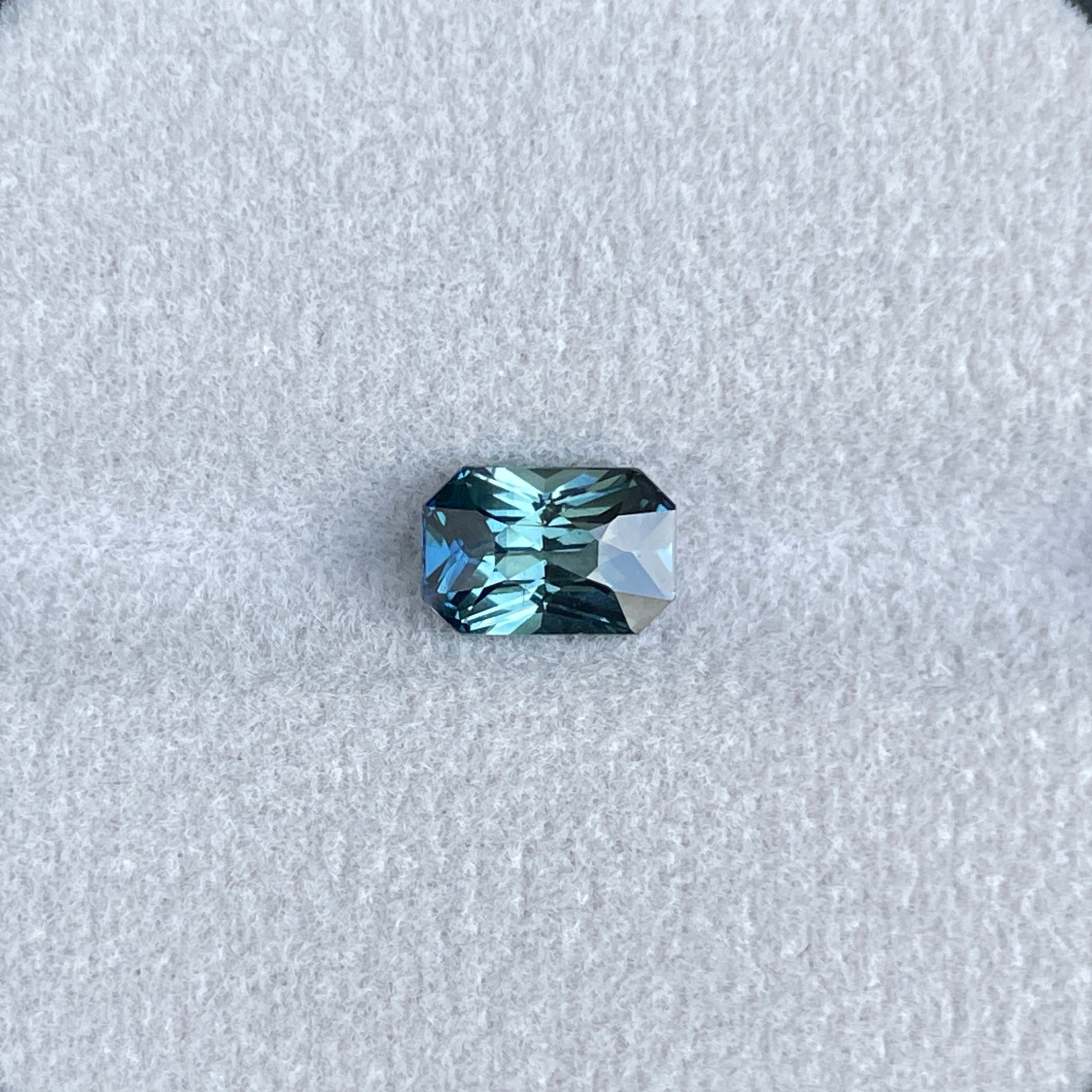 teal sapphire with 2 tones blue and green