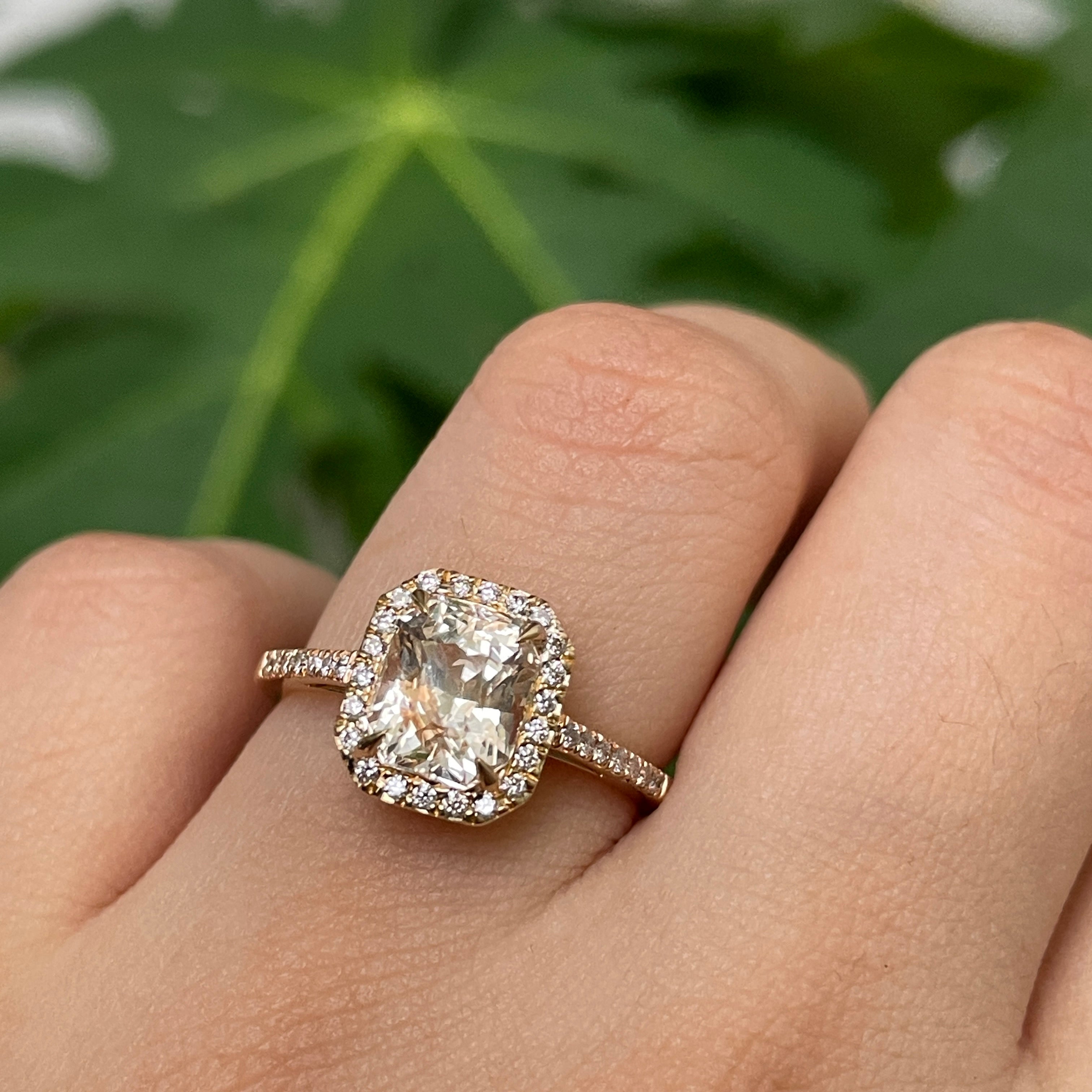 Woman removing ring before household chores