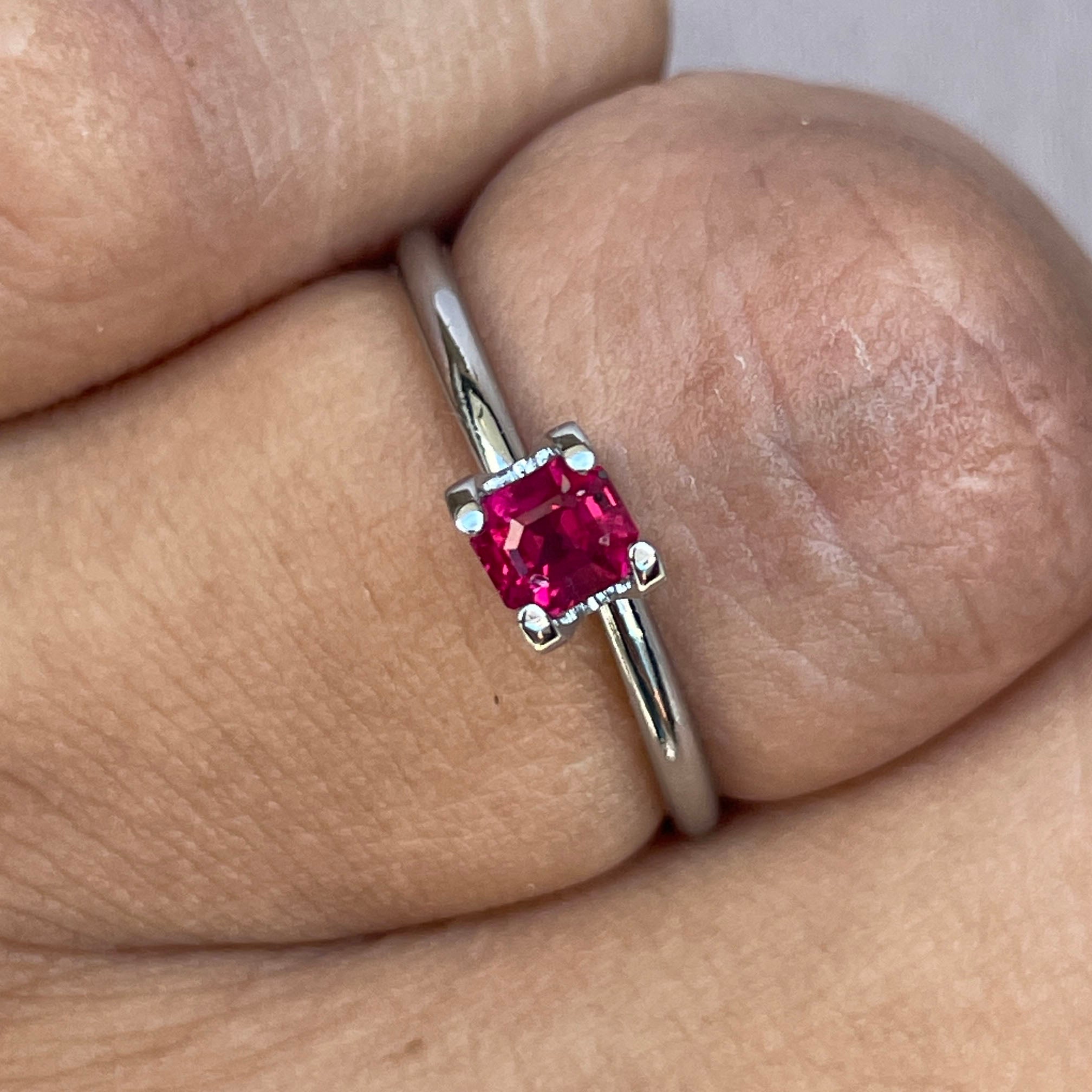 Ruby ring on hand symbolizing love and confidence