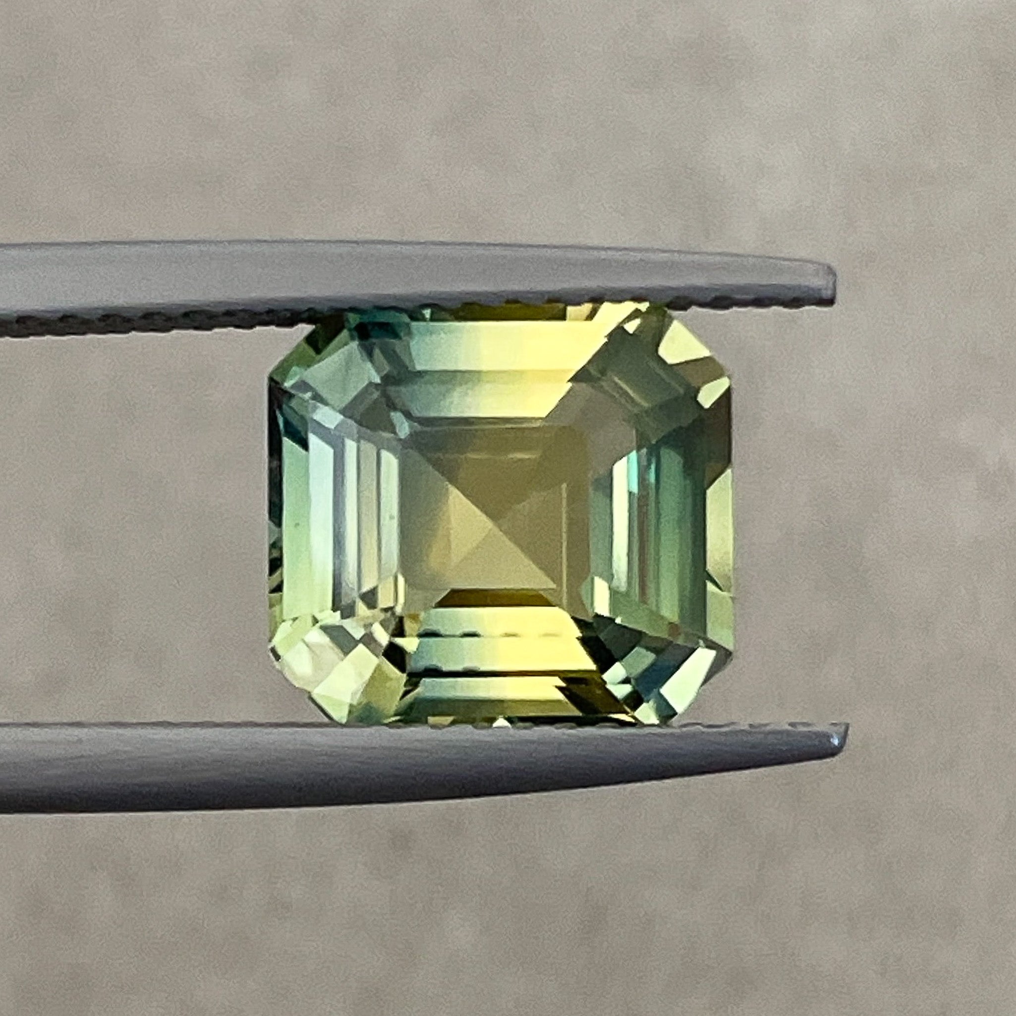 Teal natural Parti Sapphire 4.02 Ct in asscher emerald cut, bi-color green-yellow loose sapphire by NASHGEMS for custom engagement rings