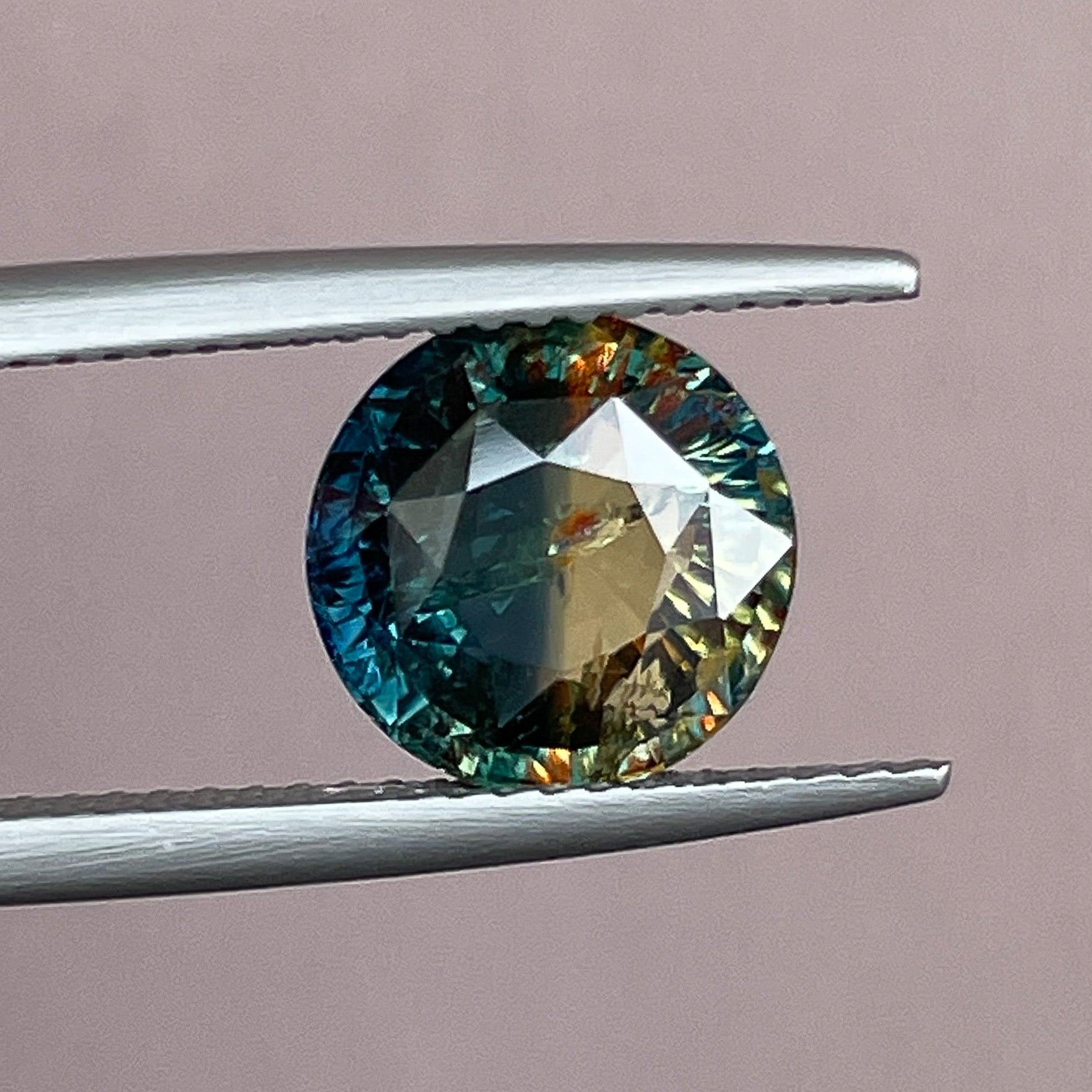 Teal natural bi-color sapphire, 3.70 Ct round cut loose sapphire from NASHGEMS, ideal for engagement or custom jewelry.