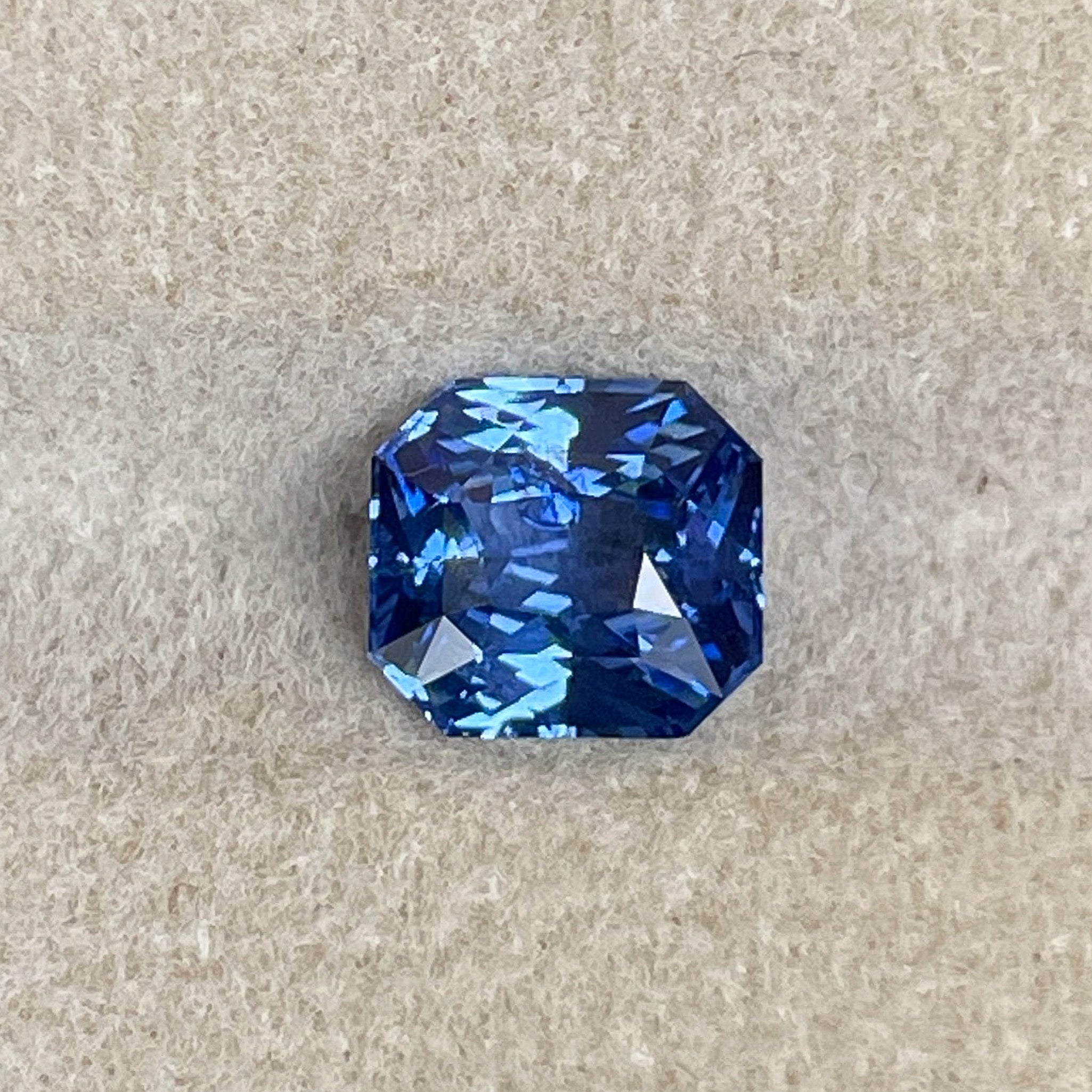 Natural Ceylon Blue Sapphire 1.52 Ct in radiant cut, vivid blue loose gemstone by NASHGEMS for engagement or custom jewelry.