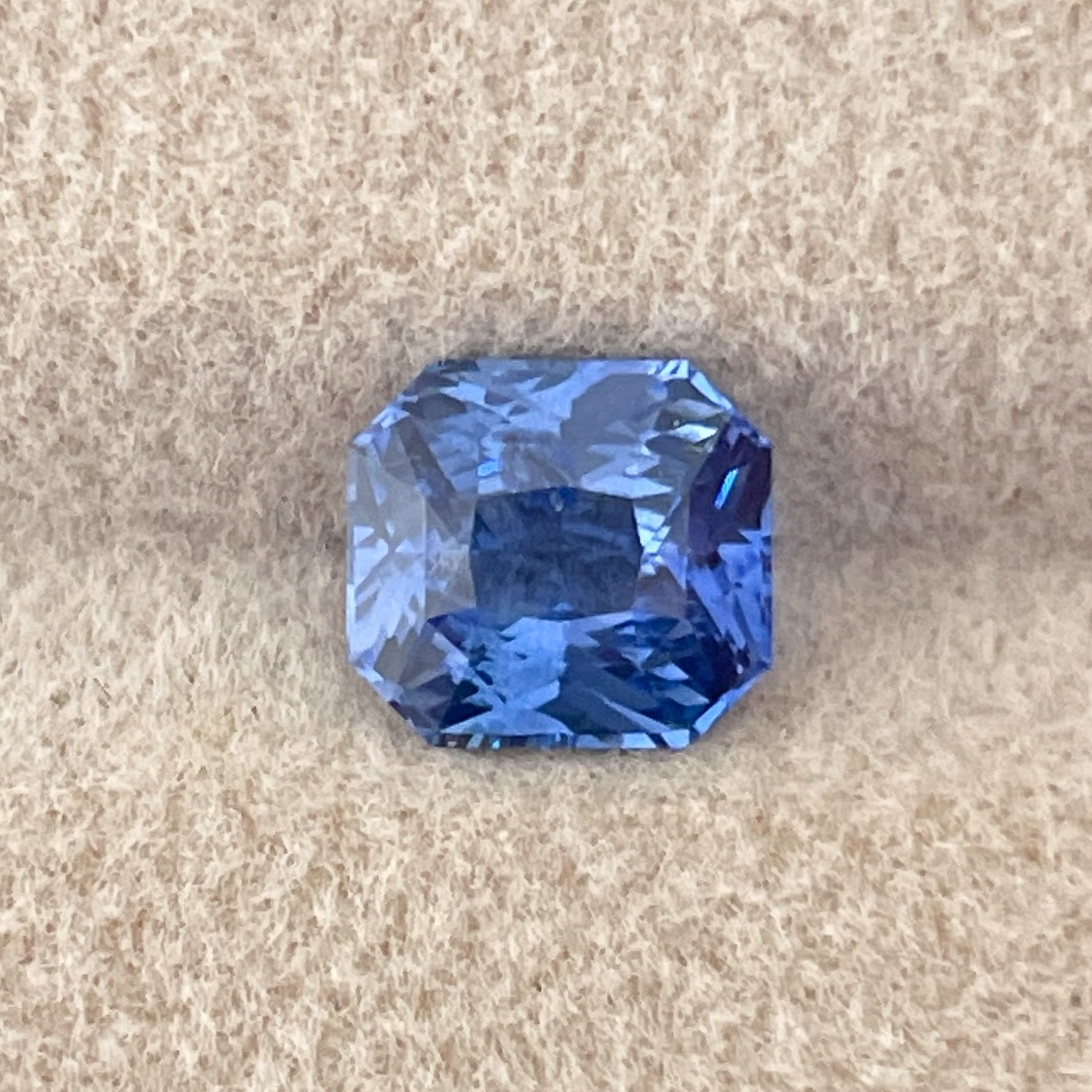 Natural Ceylon Blue Sapphire 1.52 Ct radiant cut, vivid blue loose gemstone by NASHGEMS, ideal for engagement rings or custom jewelry.