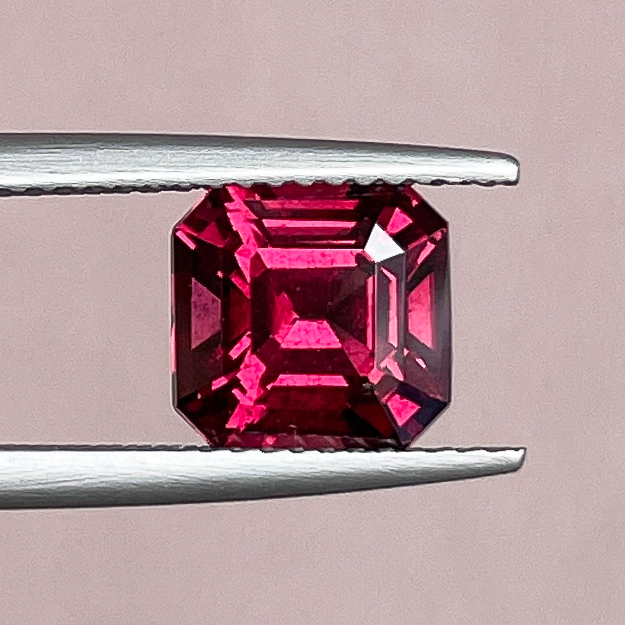 Natural Pyrope Almandite Garnet 3.12 Ct emerald cut loose gemstone in deep red, ideal for engagement rings, by NASHGEMS.