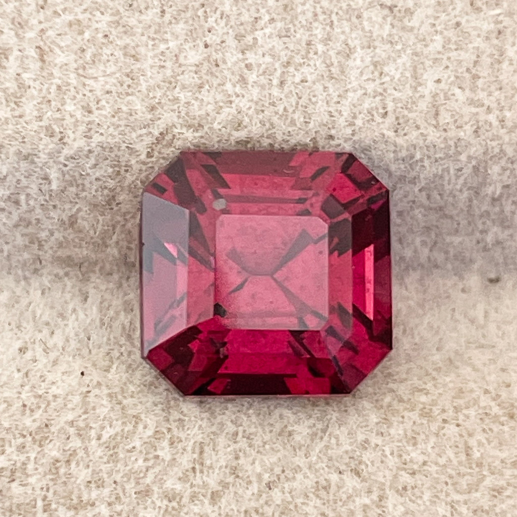 Natural Pyrope Almandite Garnet 3.12 Ct emerald cut loose gemstone with deep red color, ideal for engagement rings.