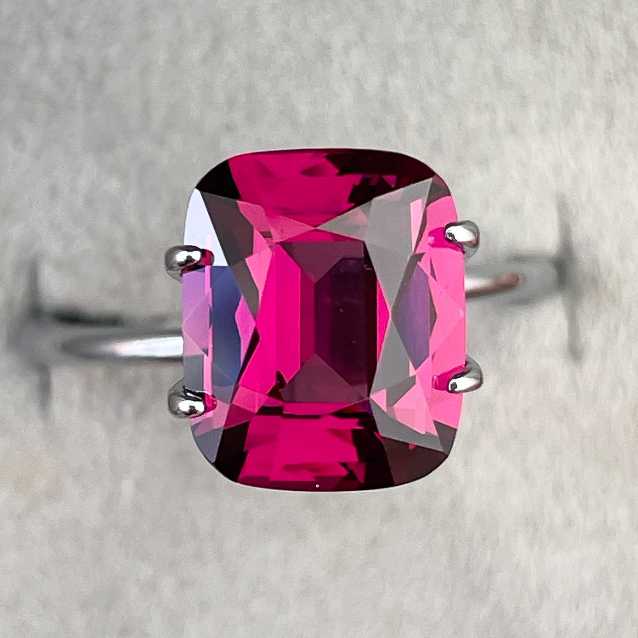Natural Rhodolite Garnet 4.14 Ct cushion cut loose gemstone in raspberry red, VVS clarity, ideal for engagement rings.