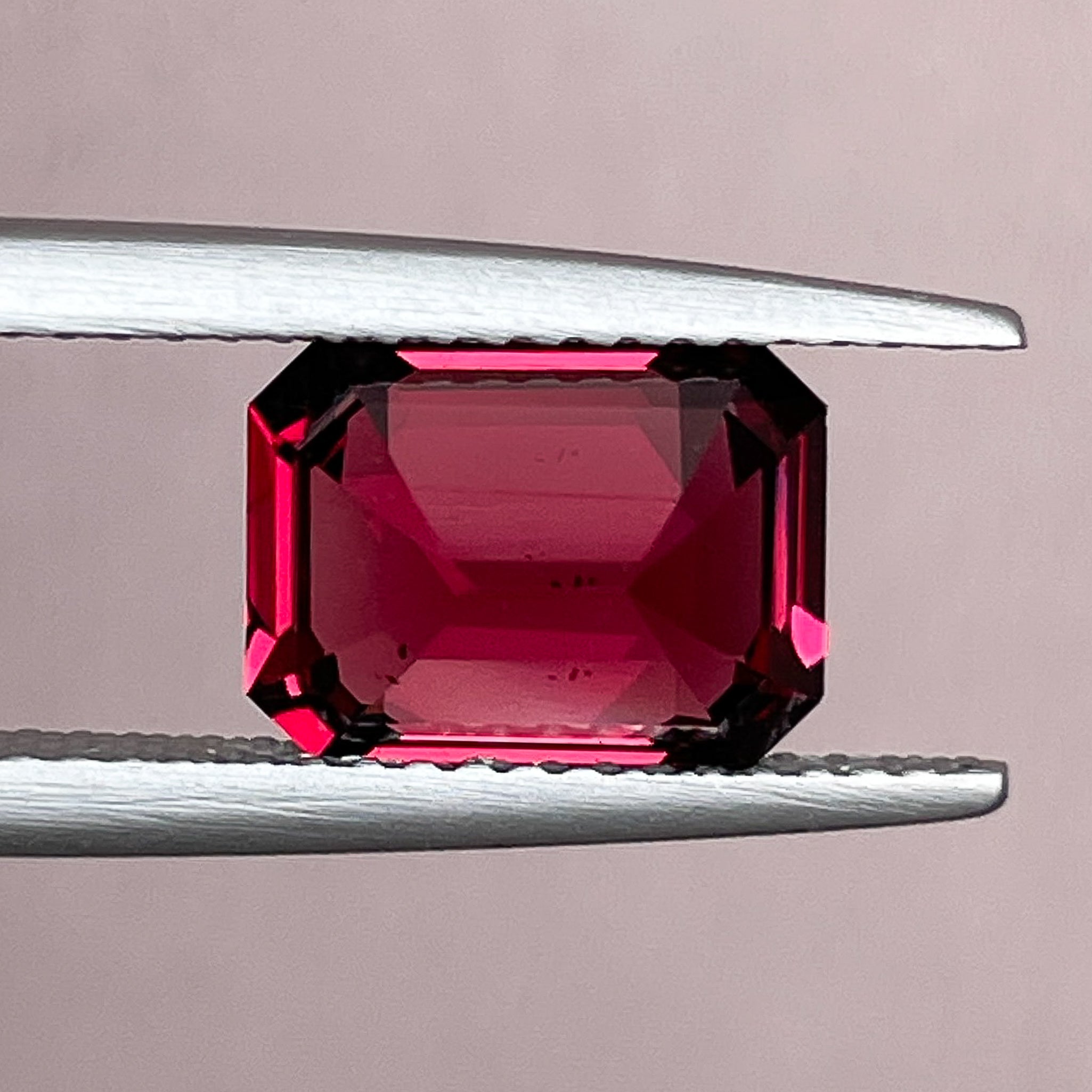 Deep red natural Pyrope Almandite Garnet 3.38 Ct emerald cut loose gemstone by NASHGEMS for engagement rings.