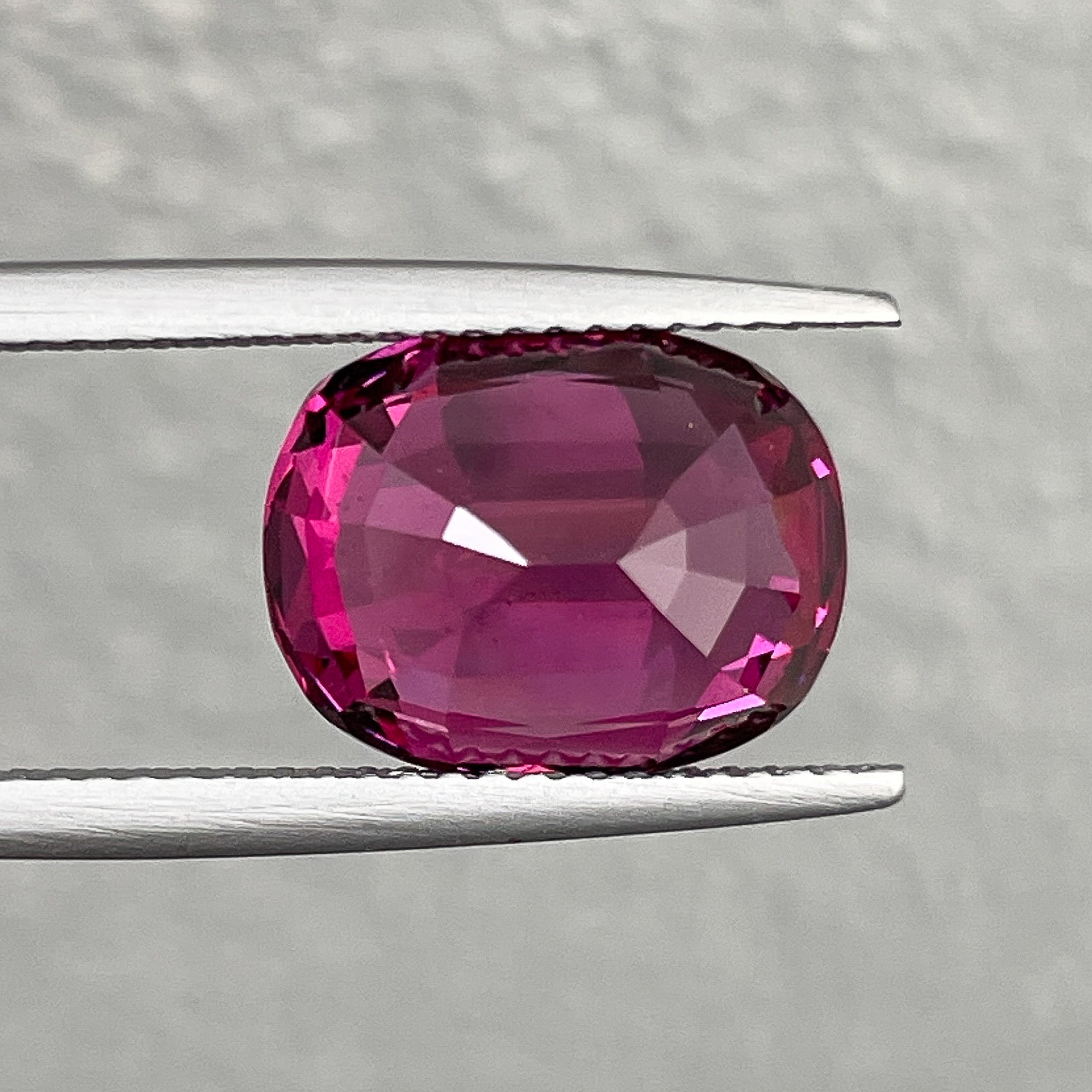 Oval cut natural Rhodolite Garnet, 7.07 Ct, Raspberry Red VVS loose gemstone for engagement rings, by NASHGEMS.