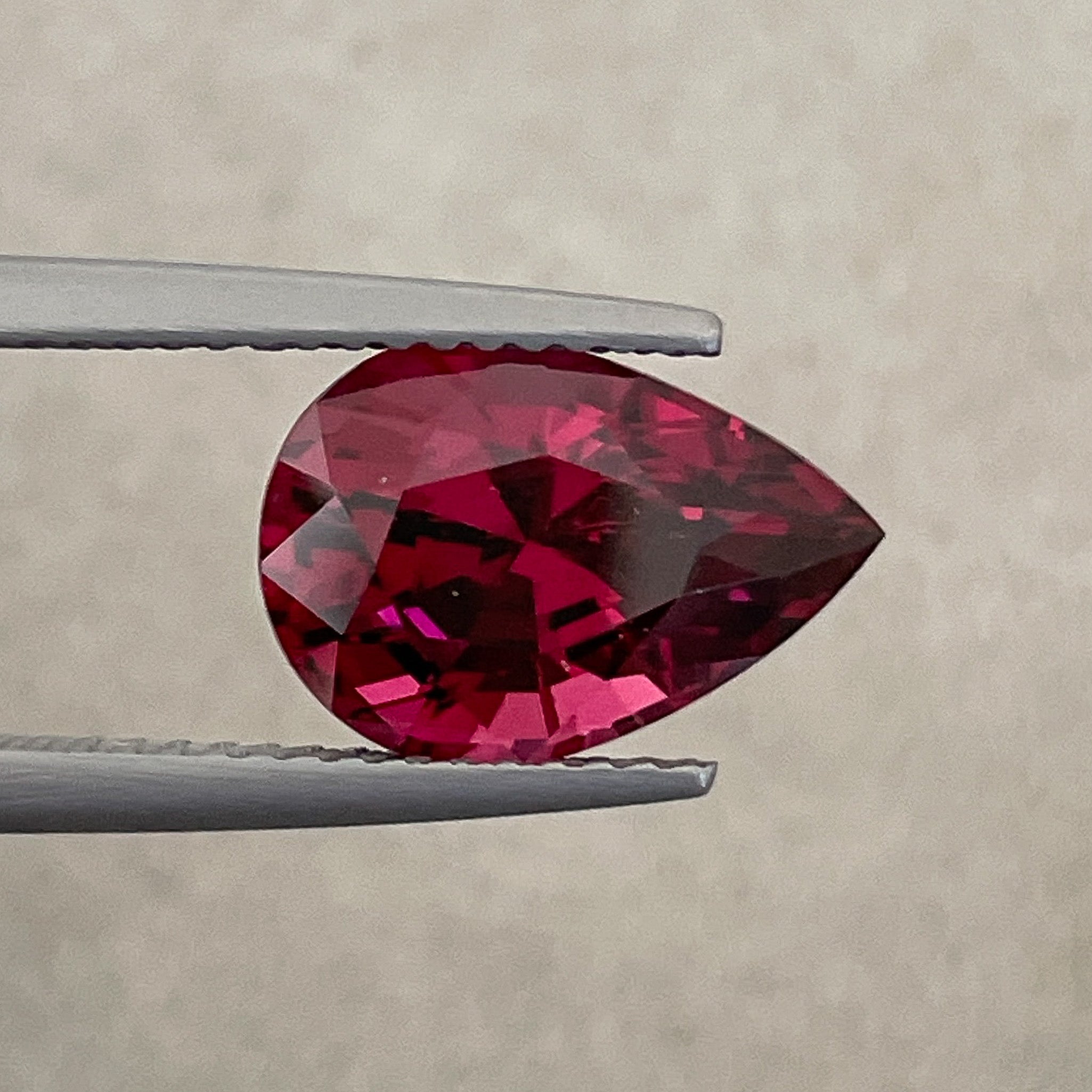 Natural Rhodolite Garnet 4.33 Ct pear-shaped loose gemstone with raspberry red color, ideal for engagement rings.