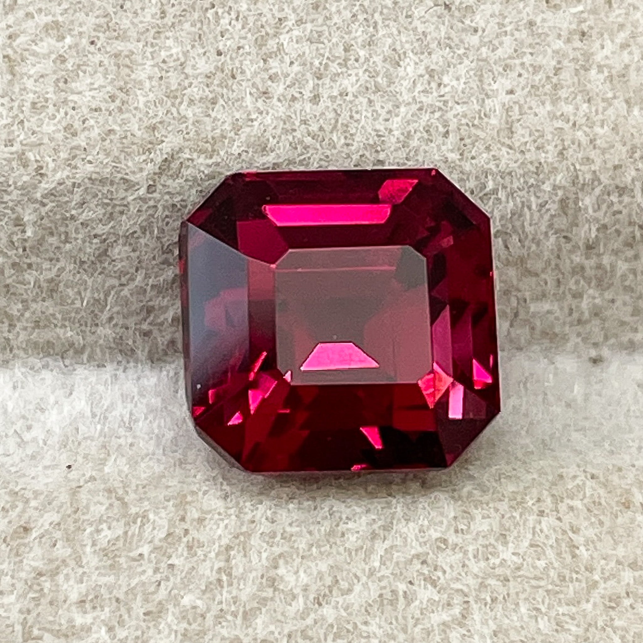 Natural Pyrope Almandite Garnet 3.38 Ct emerald cut, deep red VVS loose garnet gemstone for jewelry and engagement rings.