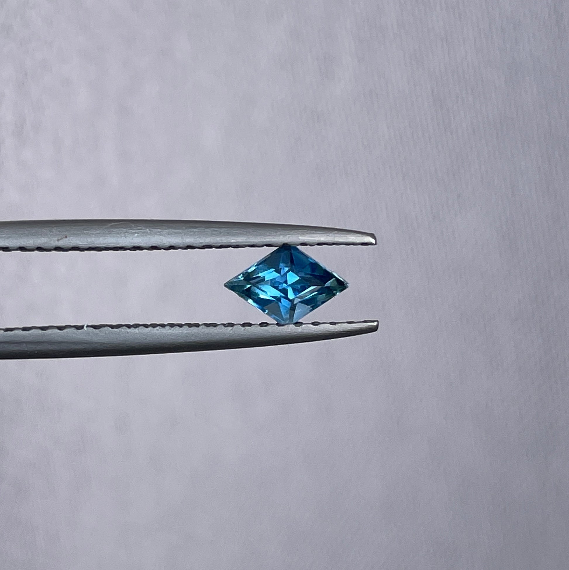 Certified heated Teal Blue kite Cut Sapphire 0.45 Carats 4.00 x 6.10 x 3.30mm
