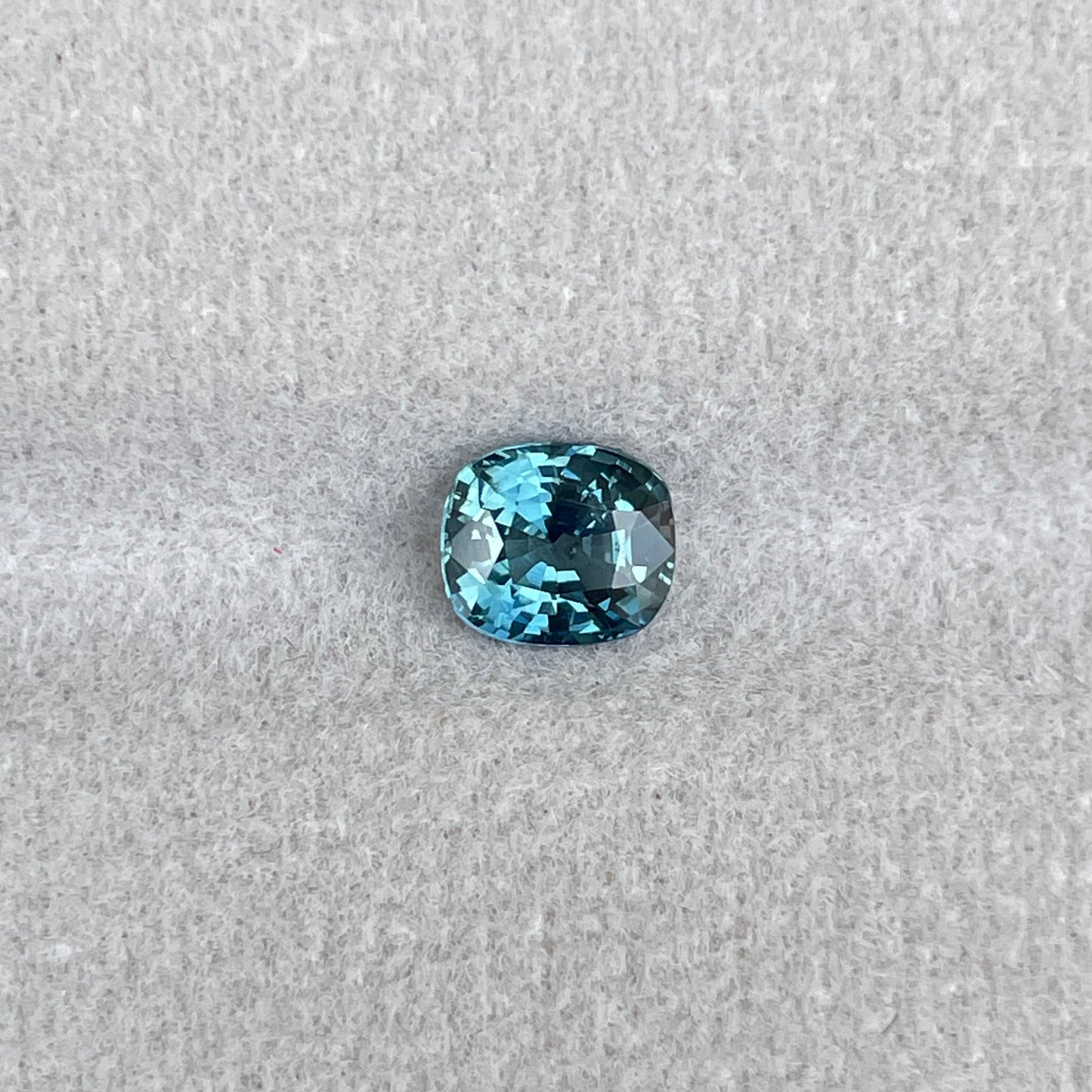 1.05 carat cushion teal sapphire