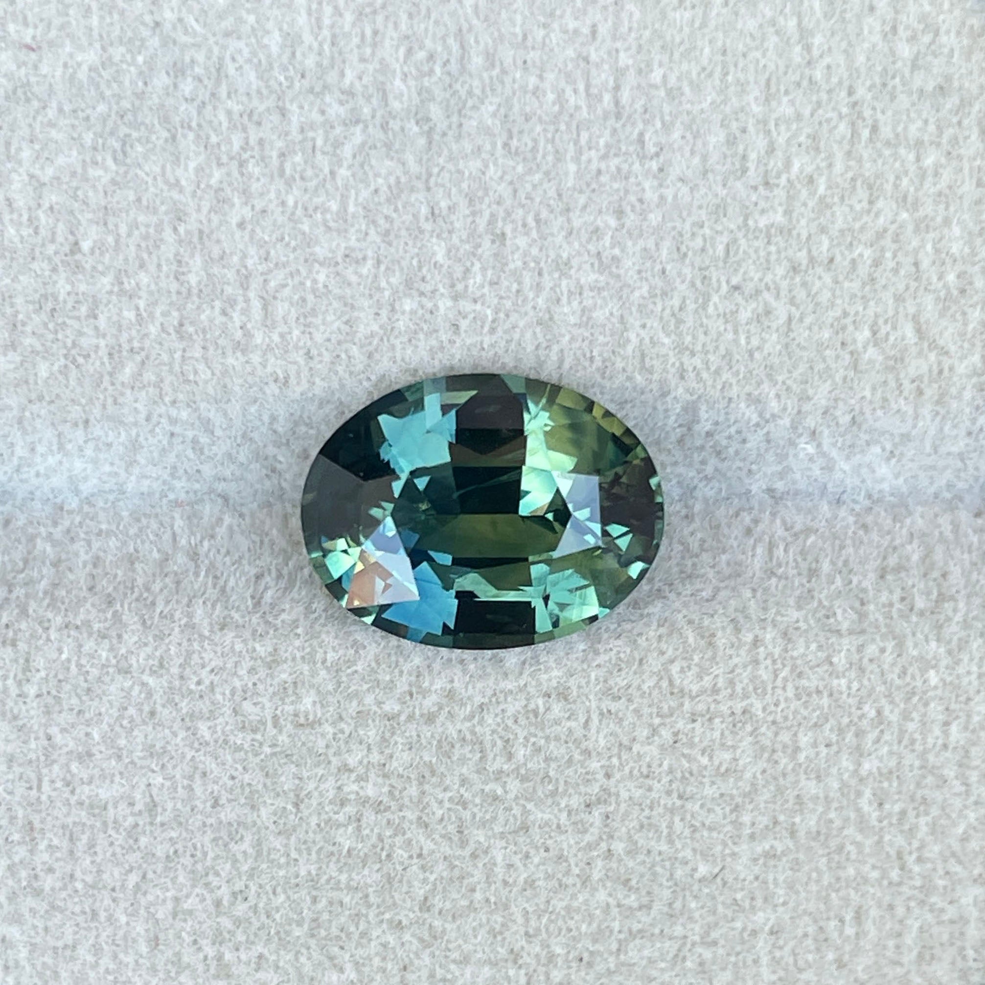 NATURAL PARTI SAPPHIRE TEAL OVAL 5.36