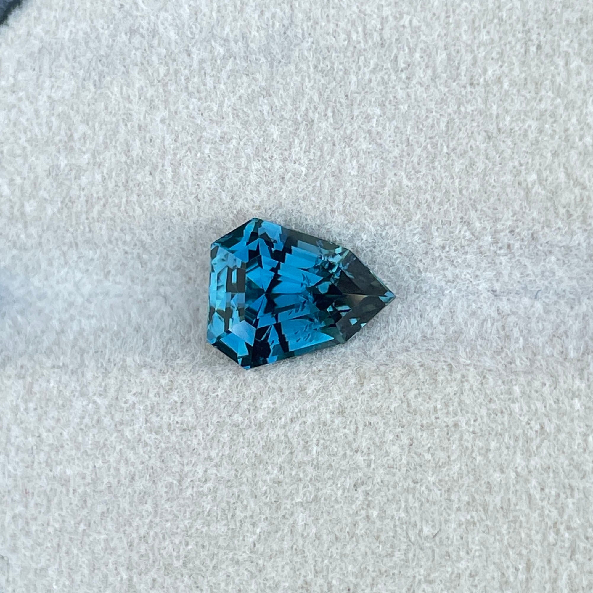 NATURAL TEAL SAPPHIRE SHEILD CUT 3.51