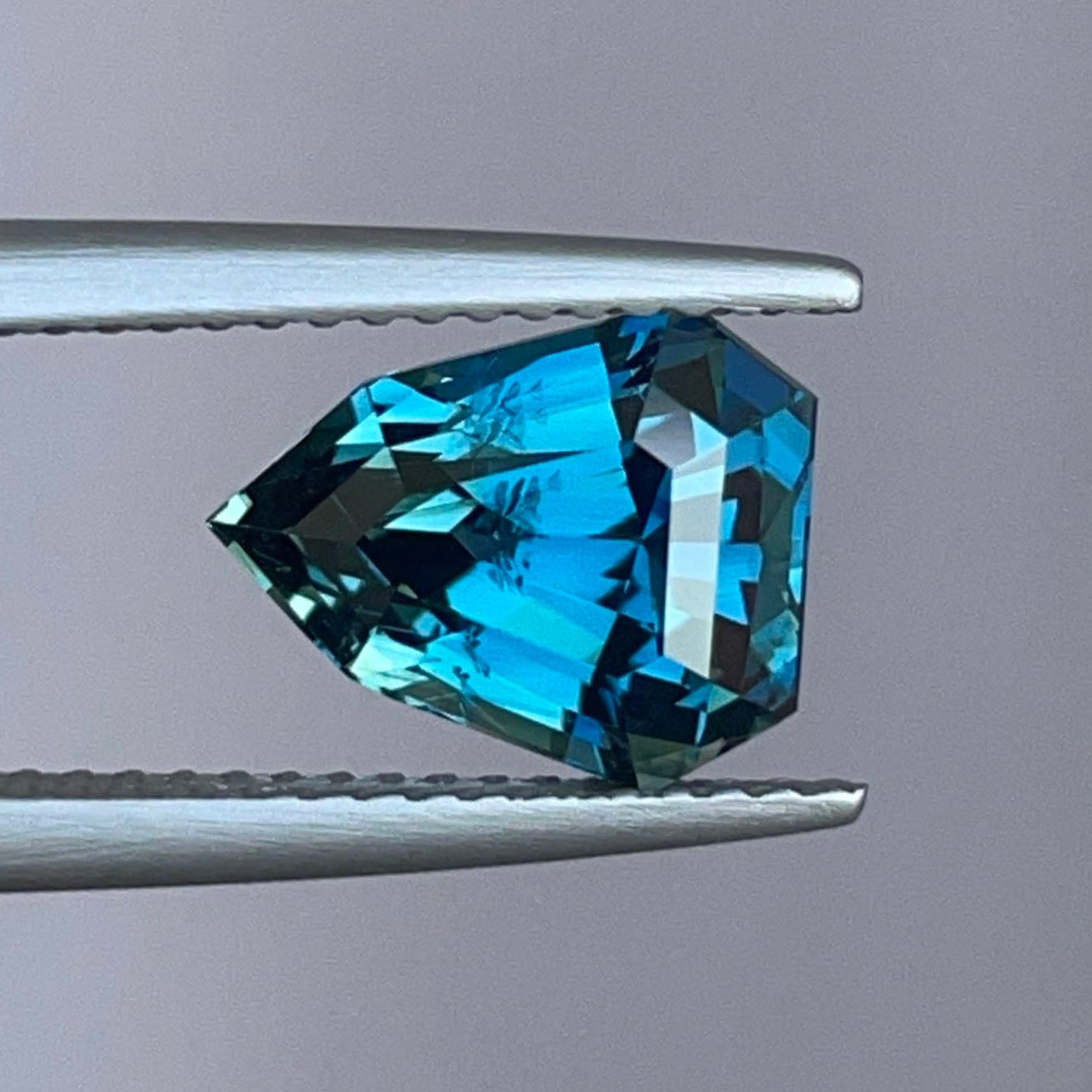 Natural teal blue green sapphire shield cut 3.51 ct, heat treated loose gemstone for custom ring, engagement, or pendant.