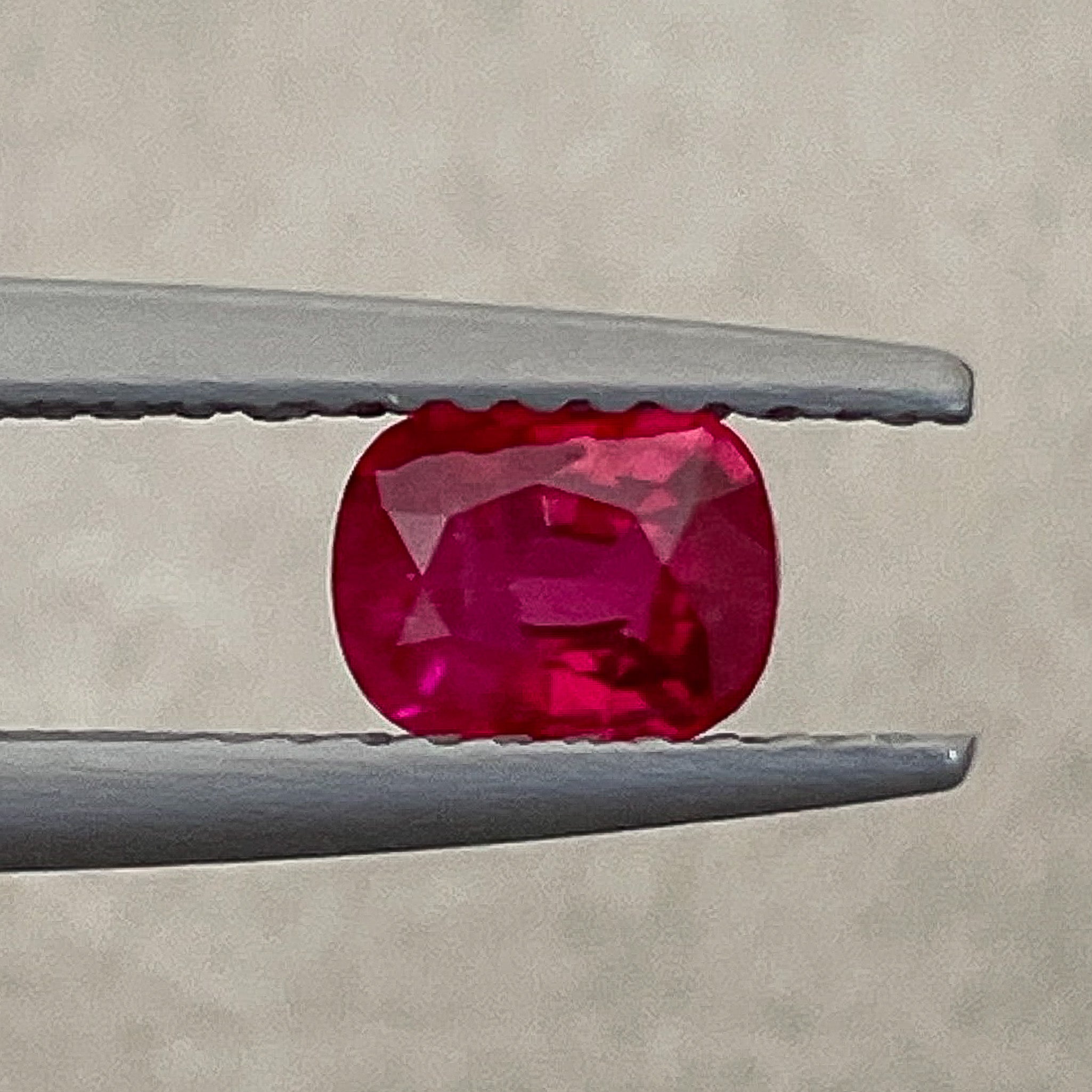 Natural 0.67 Ct cushion cut ruby gemstone from Nashgems, loose unheated ruby for engagement rings, vibrant and radiant.