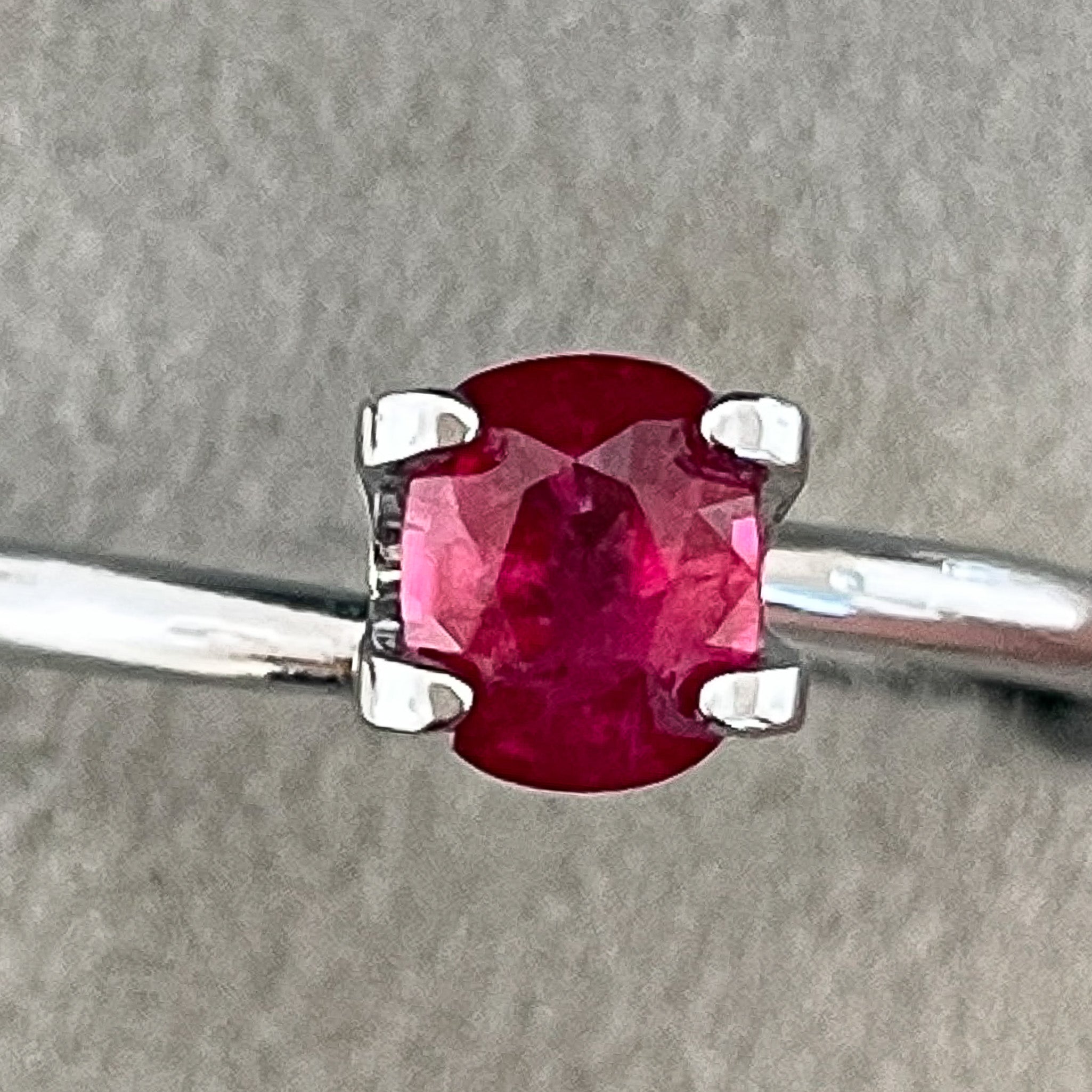 Natural 0.67 Ct cushion cut ruby gemstone from NASHGEMS, loose and unheated, ideal for engagement rings.