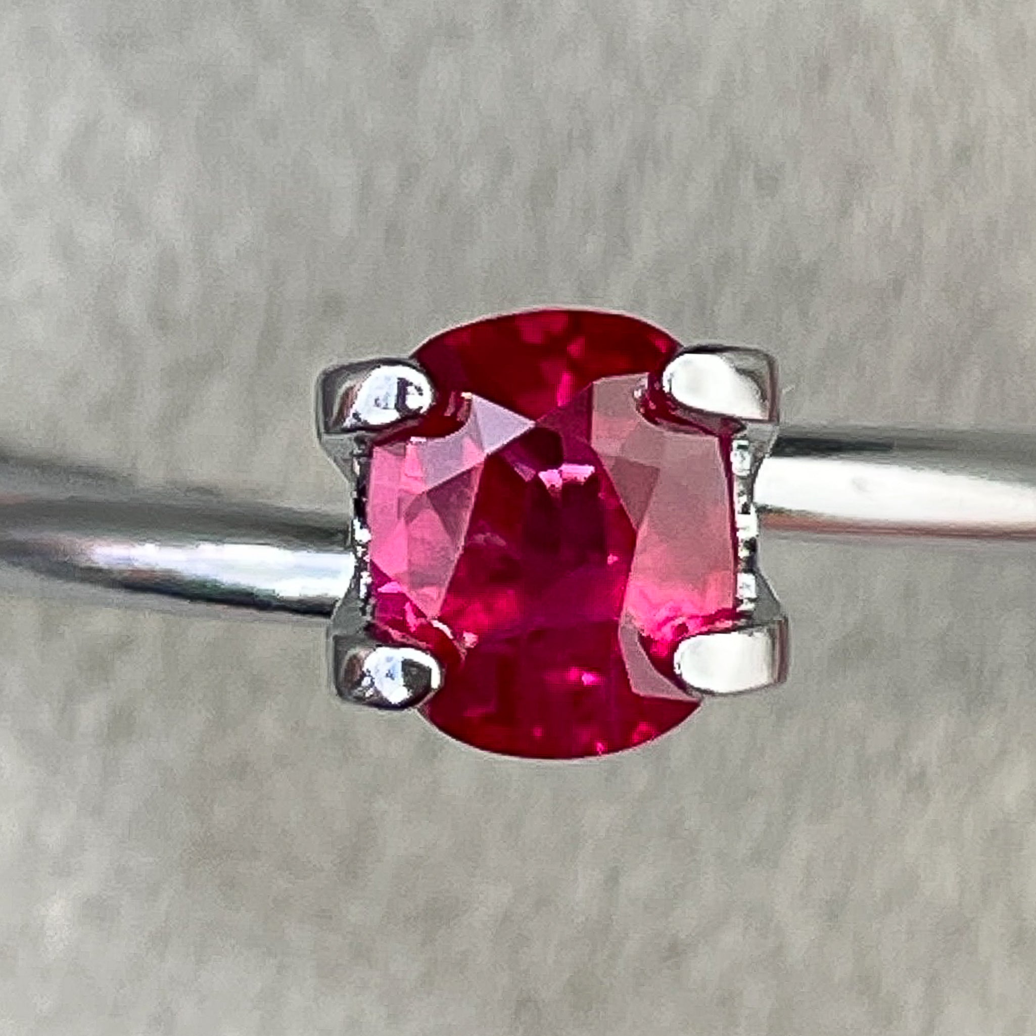 Natural Ruby 0.67 ct cushion cut loose gemstone from Nashgems, perfect for engagement rings, no heat treated, vibrant and radiant.