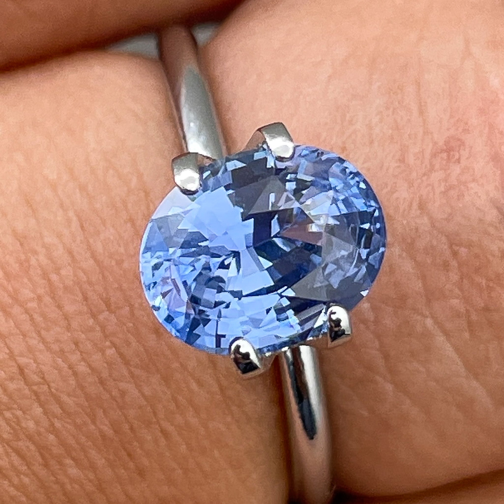 Natural Ceylon Blue Sapphire 2.15 Ct oval cut, VVS clarity, loose gemstone by NASHGEMS for engagement or custom jewelry.