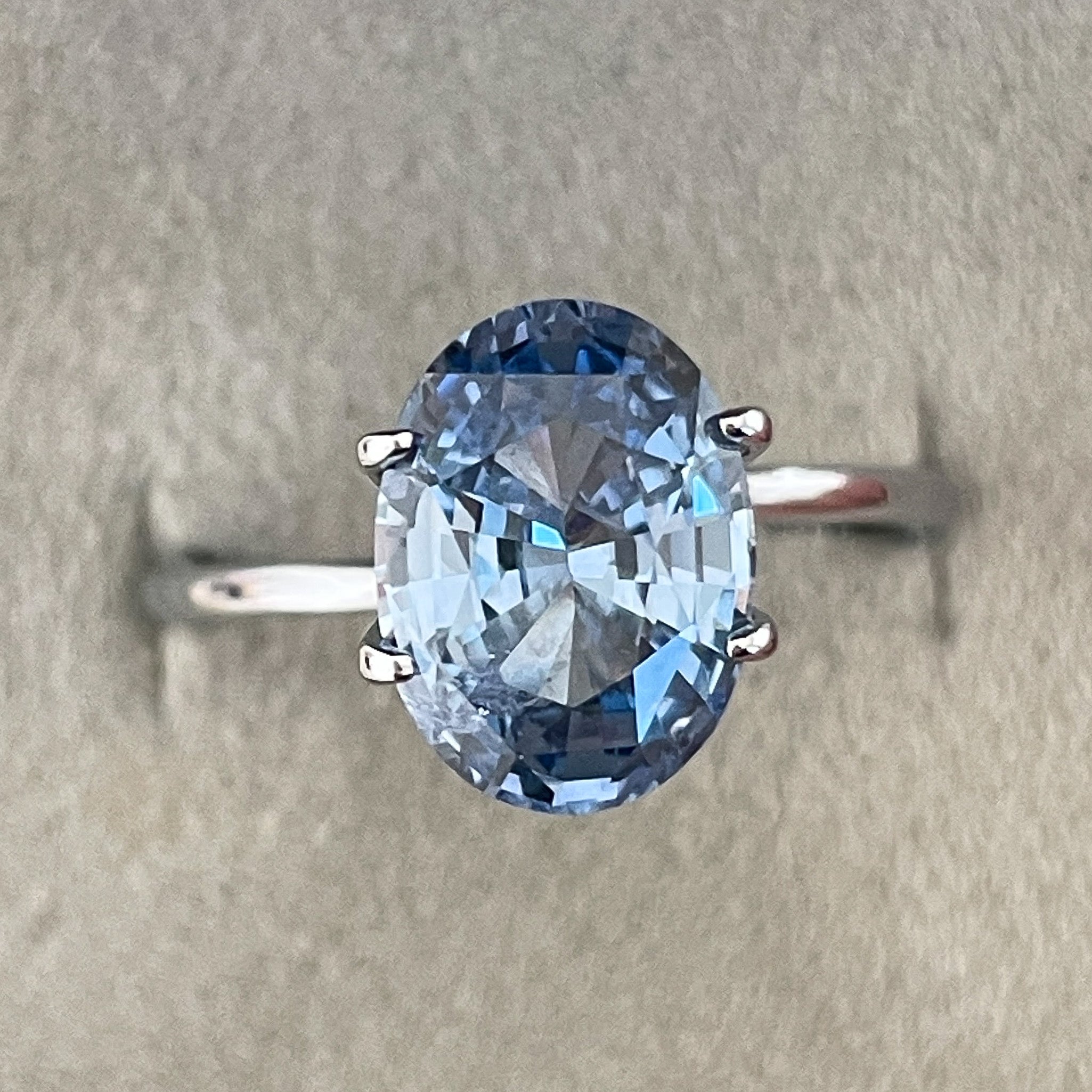 Natural Ceylon Blue Sapphire 3.34 Ct oval cut loose gemstone by NASHGEMS, ideal for engagement rings or custom jewelry.