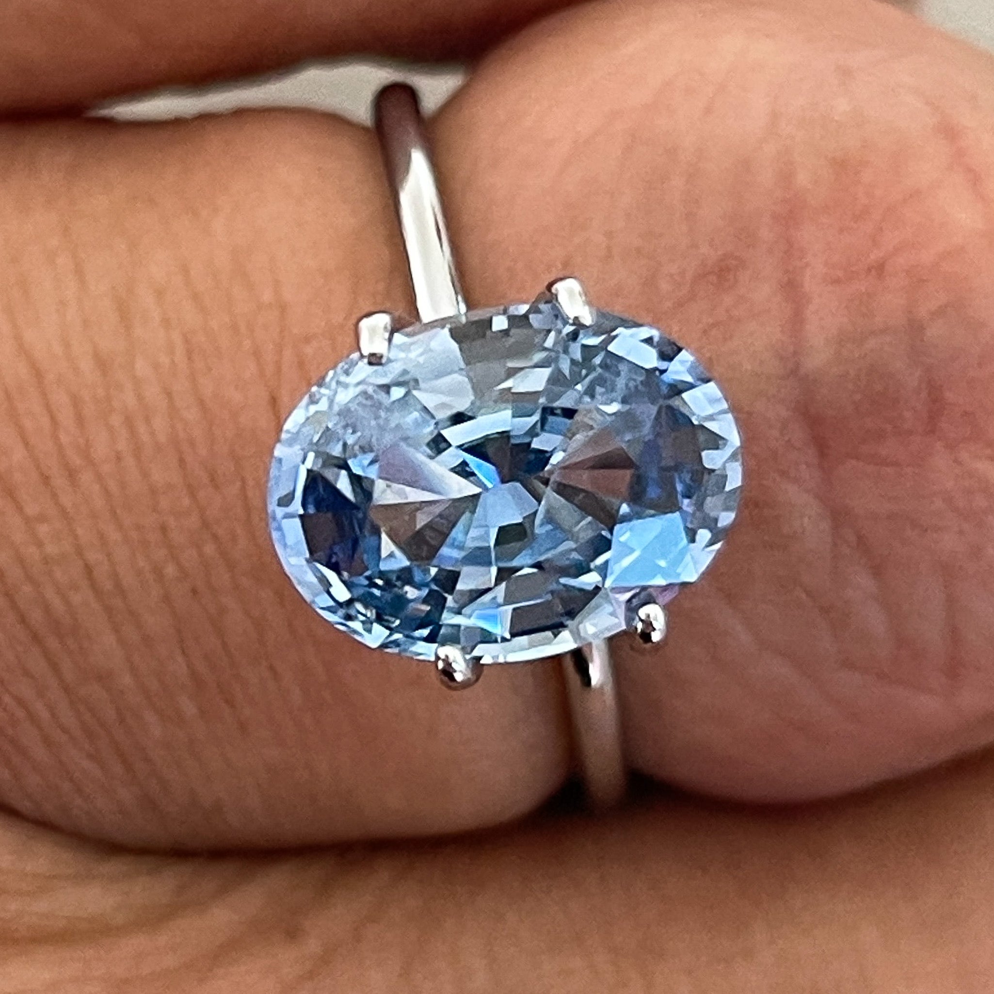 Natural Ceylon blue sapphire loose gemstone, 3.34 Ct oval cut, from NASHGEMS, suitable for engagement rings or custom jewelry.