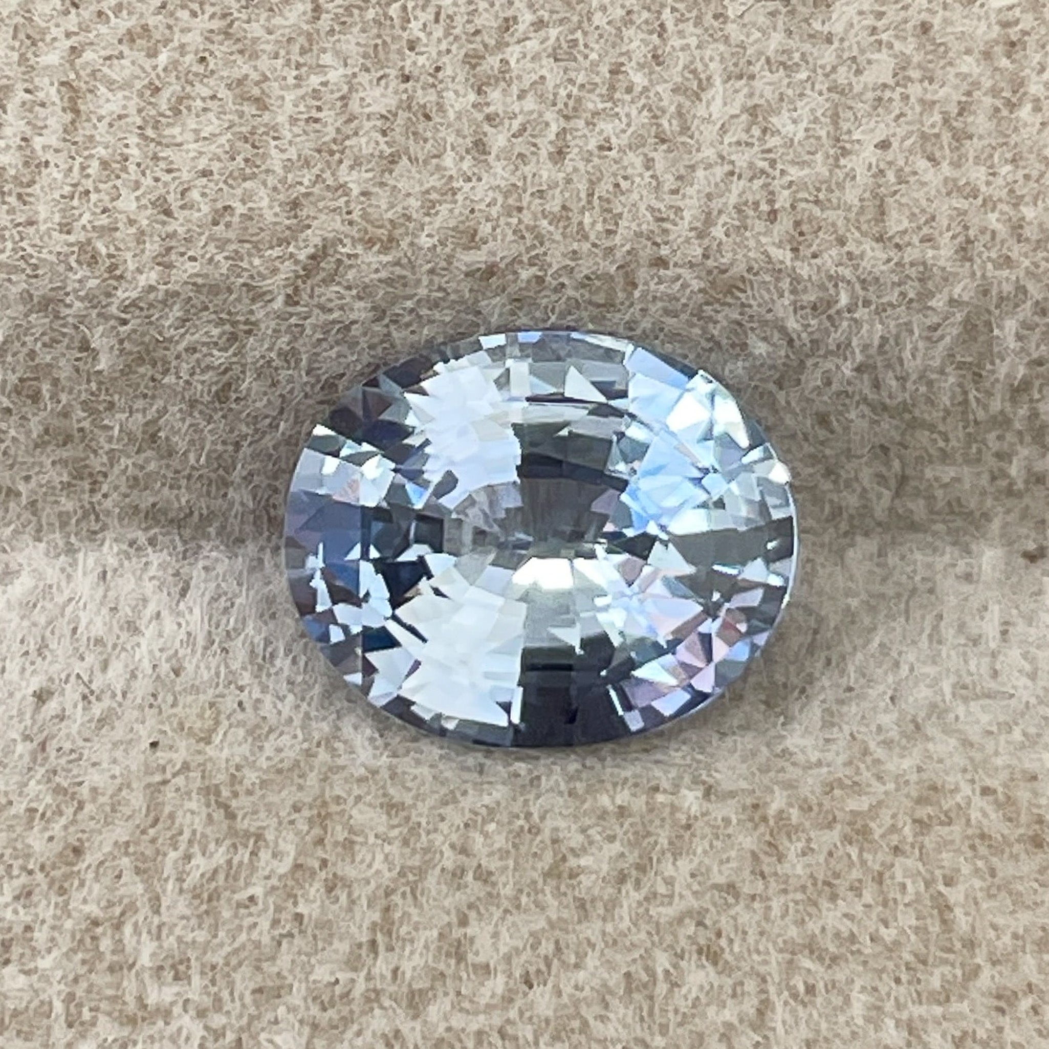 Natural Ceylon pale blue sapphire loose gemstone, 1.56 Ct oval cut, no heat VVS clarity, ideal for engagement rings, from NASHGEMS.