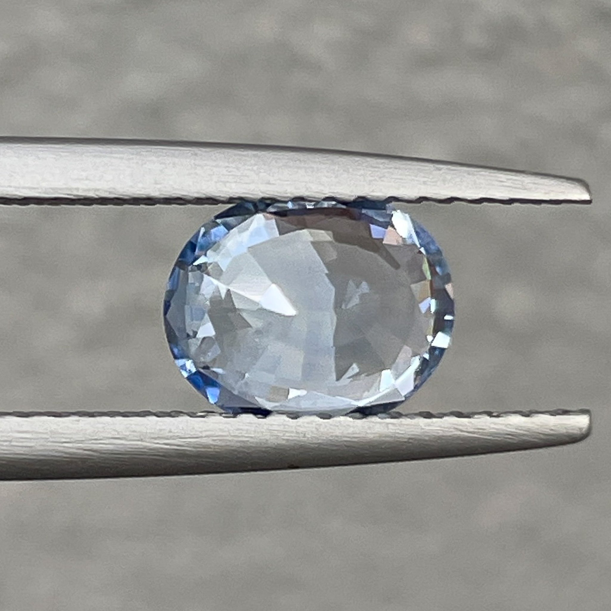 Natural Ceylon pale blue sapphire, 1.56 ct oval cut loose gemstone by NASHGEMS, VVS clarity for engagement rings.