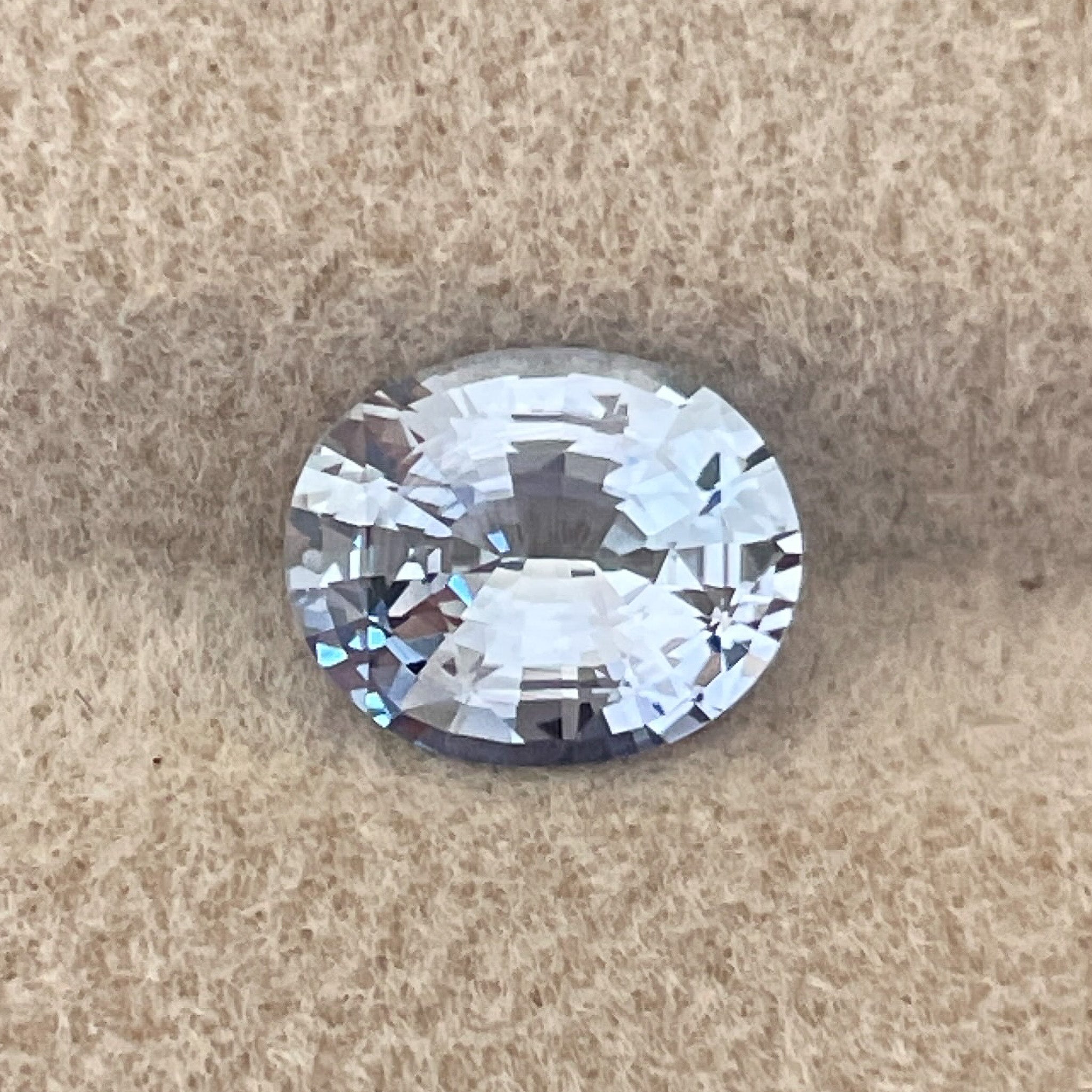 Natural Ceylon pale blue sapphire, 1.56 Ct oval cut, VVS loose gemstone by NASHGEMS, perfect for engagement rings.