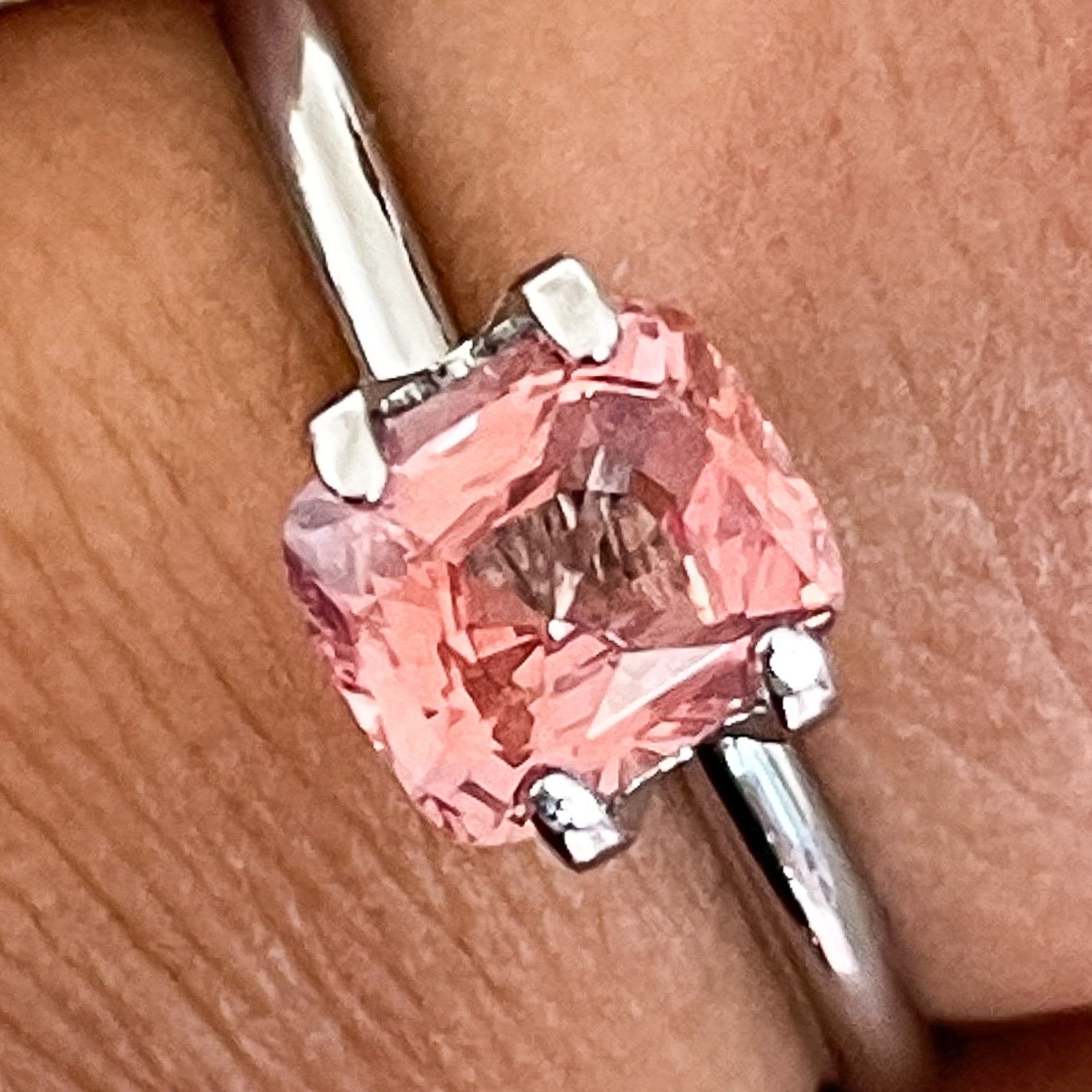 Natural padparadscha sapphire loose gemstone, 1.55 Ct cushion cut, no heat, vibrant orange-pink color for jewelry setting.
