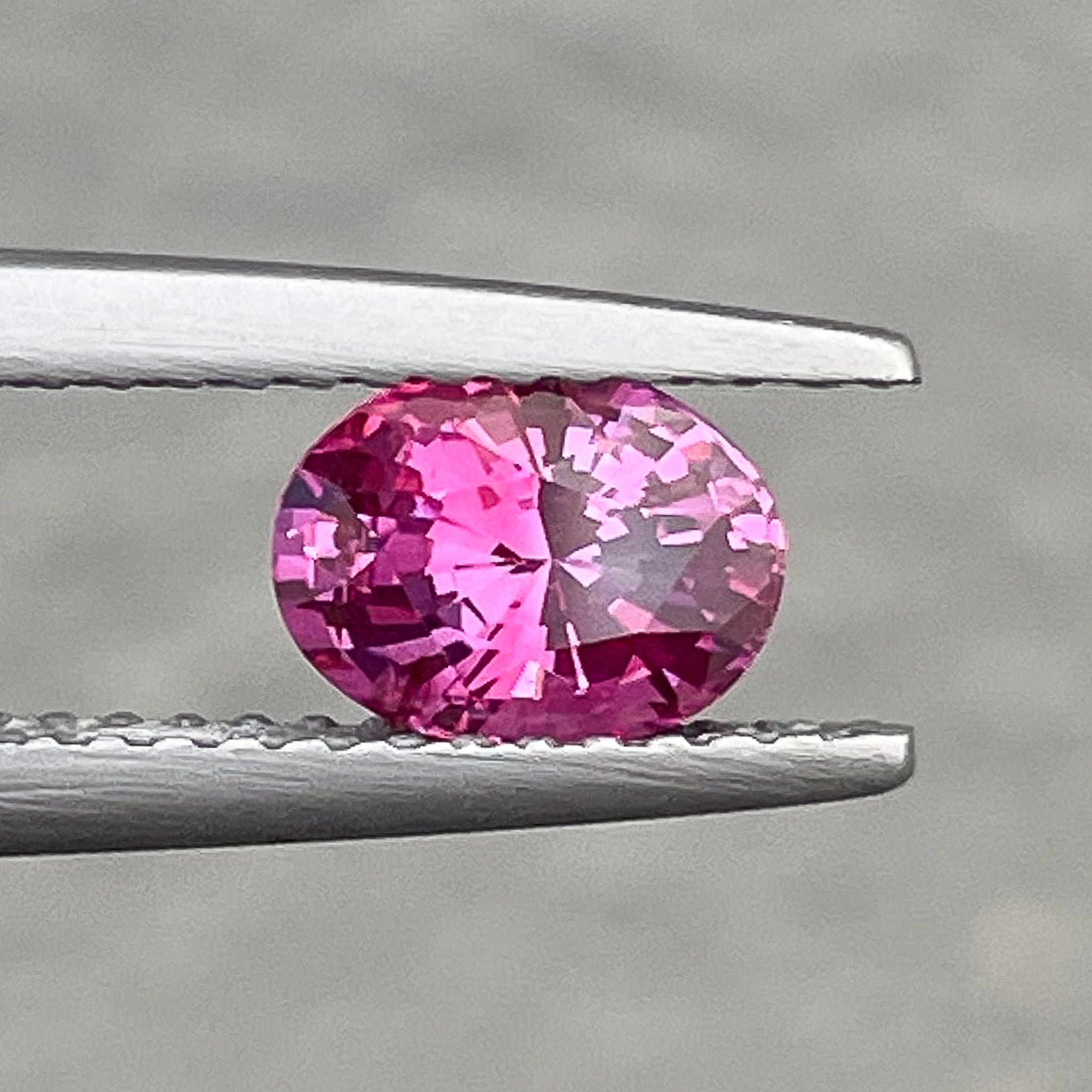 Natural pink sapphire loose gemstone, 1.00 carat oval cut, heat treated, from NASHGEMS, ideal for engagement rings.