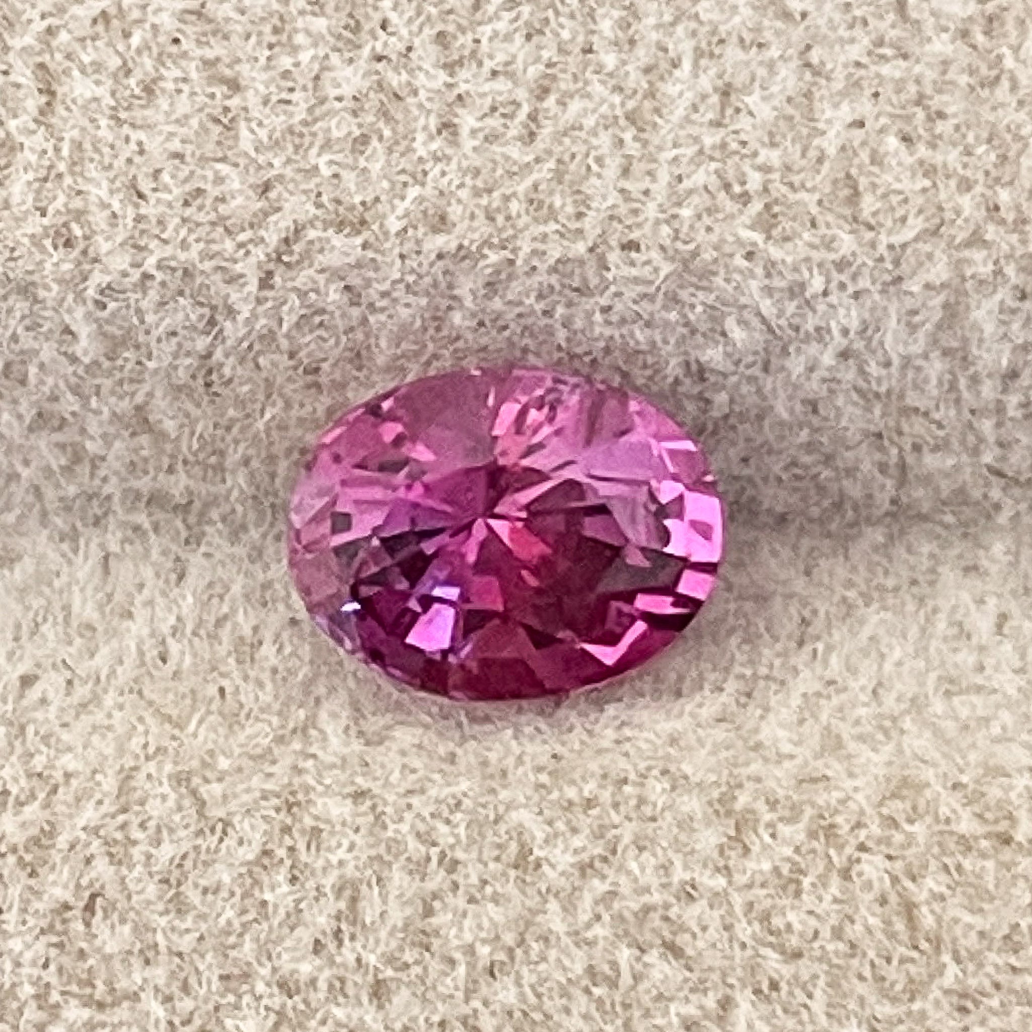 Natural pink sapphire loose gemstone, 1.00 Ct oval cut, heat treated, from NASHGEMS, ideal for engagement rings.