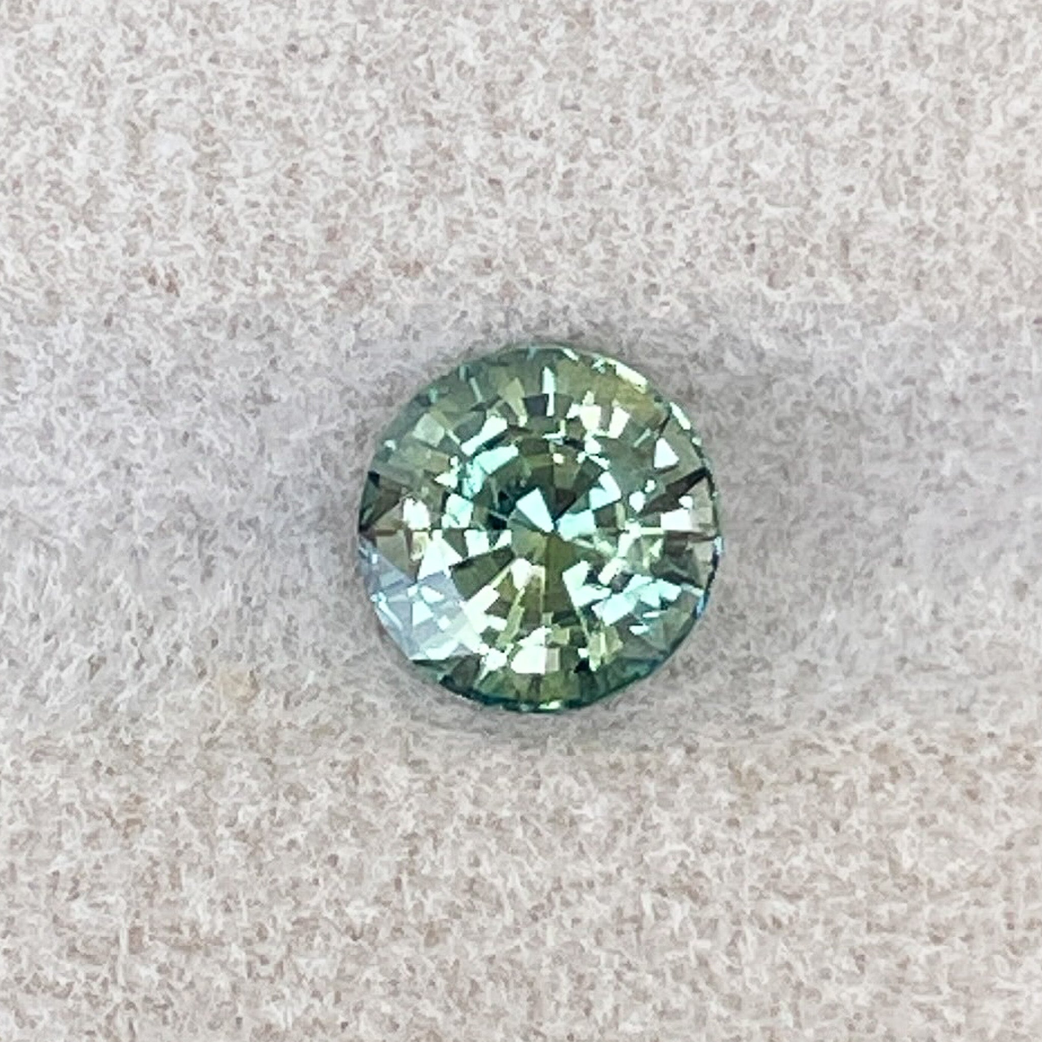 Natural green sapphire loose gemstone, 1.50 Ct round cut teal sapphire by NASHGEMS for engagement or custom jewelry.