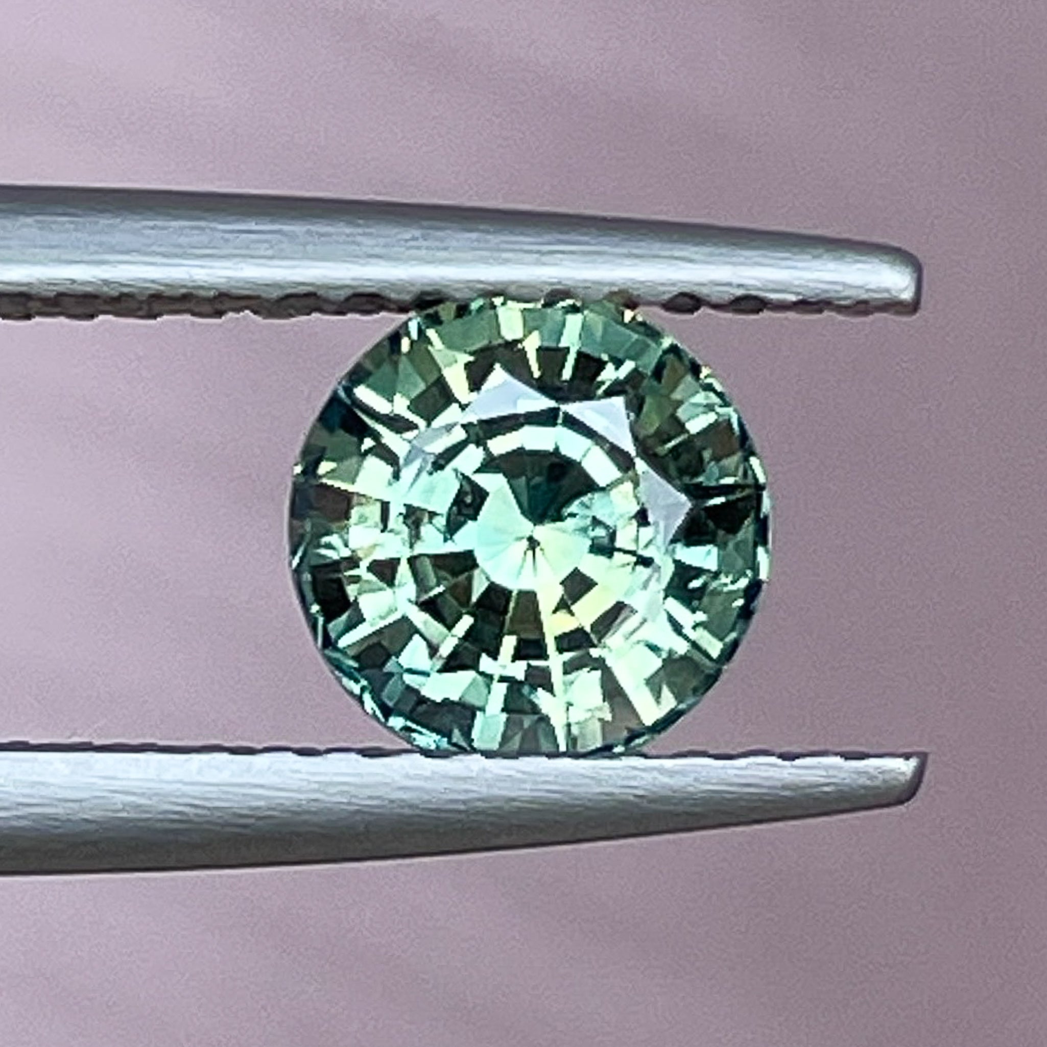 Natural green sapphire loose gemstone, 1.50 Ct round cut teal sapphire by NASHGEMS for engagement or custom jewelry.