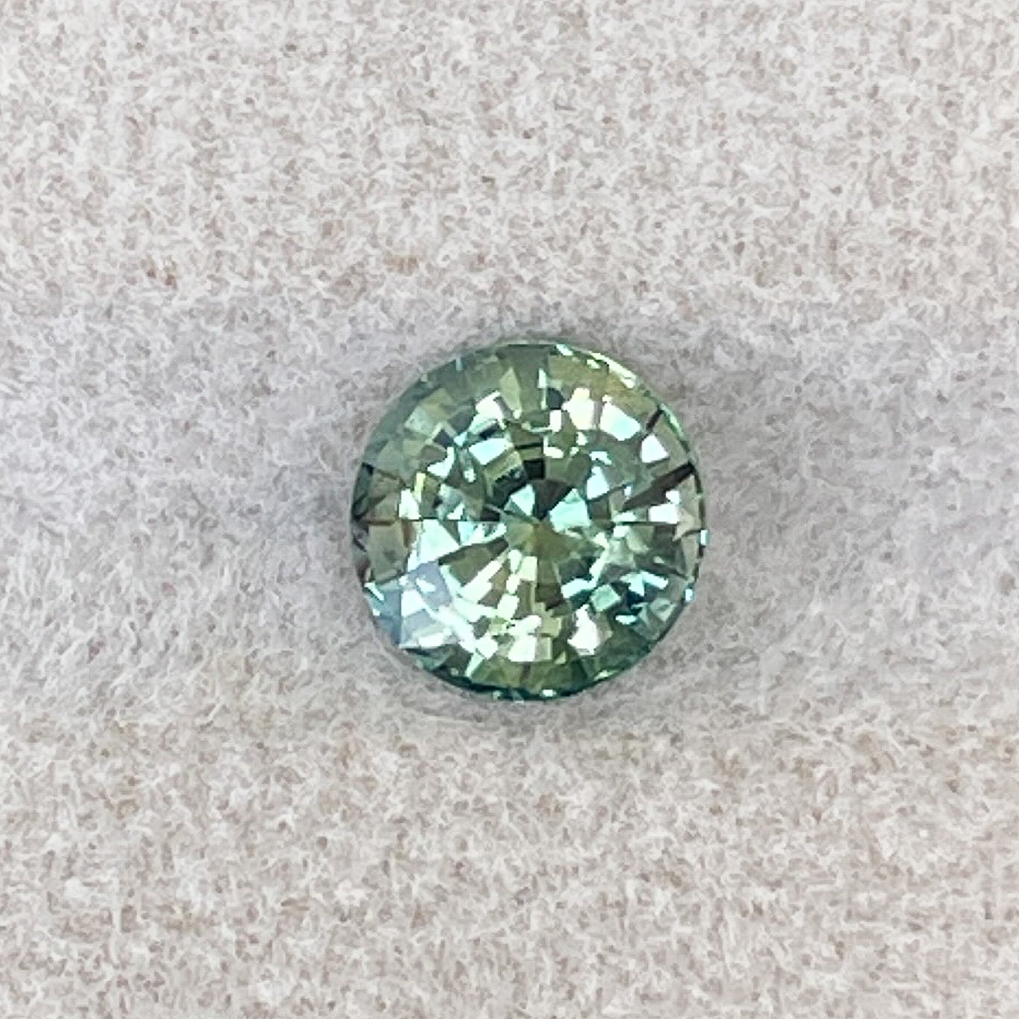 Natural green sapphire gemstone, 1.50 Ct round cut teal sapphire by NASHGEMS, loose stone for engagement or custom jewelry.