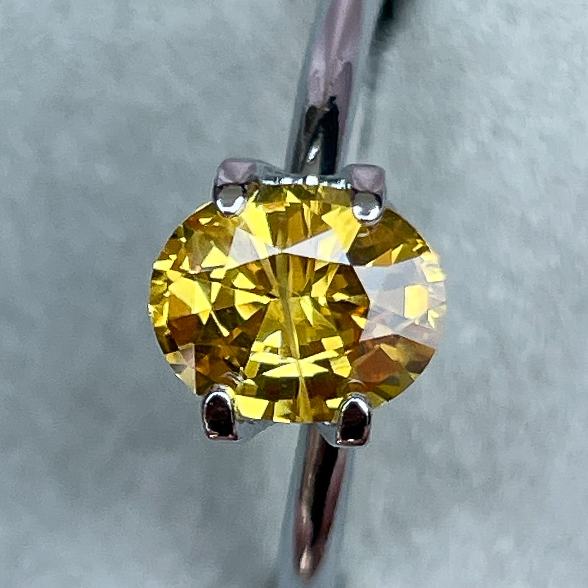Natural yellow sapphire loose gemstone, 1.27 Ct oval cut, heat treated, from NASHGEMS, ideal for engagement rings.