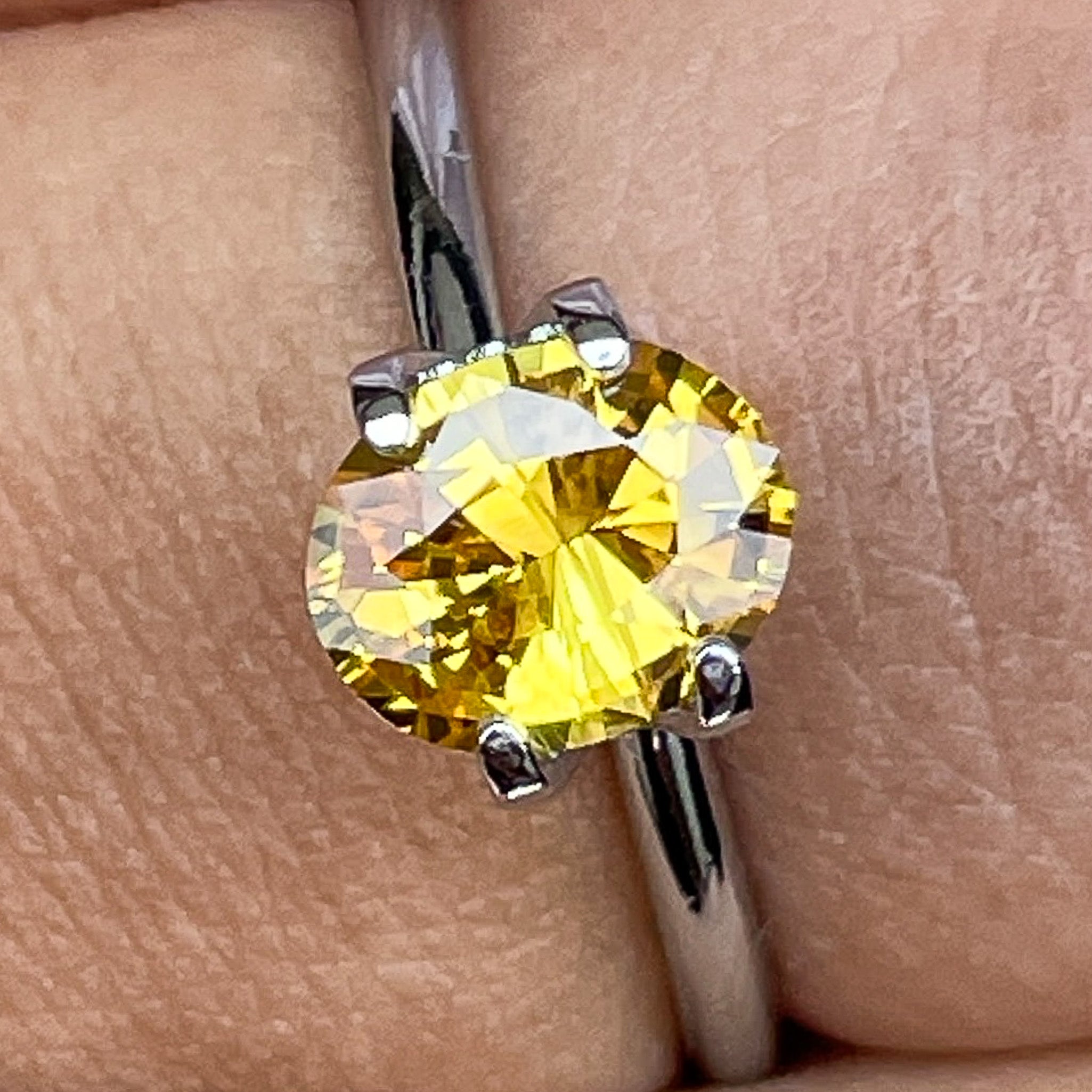Natural yellow sapphire loose gemstone, 1.27 ct oval cut by NASHGEMS, heat treated for engagement ring use.