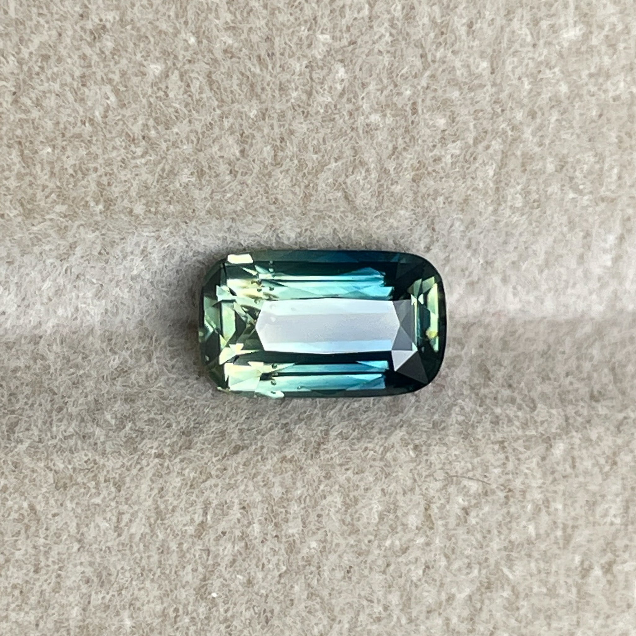 Teal natural Parti bi-color sapphire, 1.55 Ct elongated cushion cut, loose gemstone by NASHGEMS for jewelry or engagement use