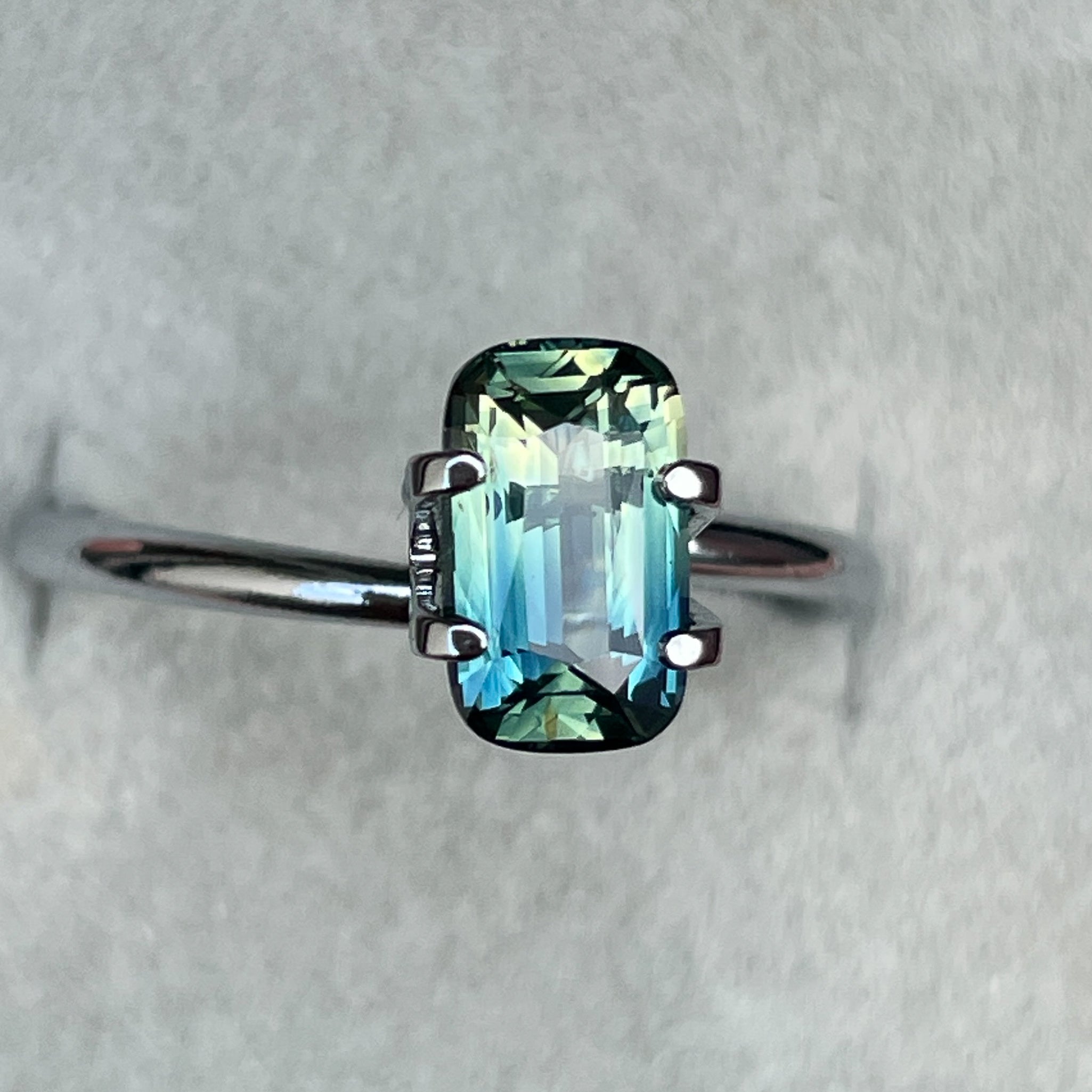 Teal natural parti bi-color sapphire, 1.55 Ct elongated cushion cut, loose gemstone for engagement or custom jewelry.