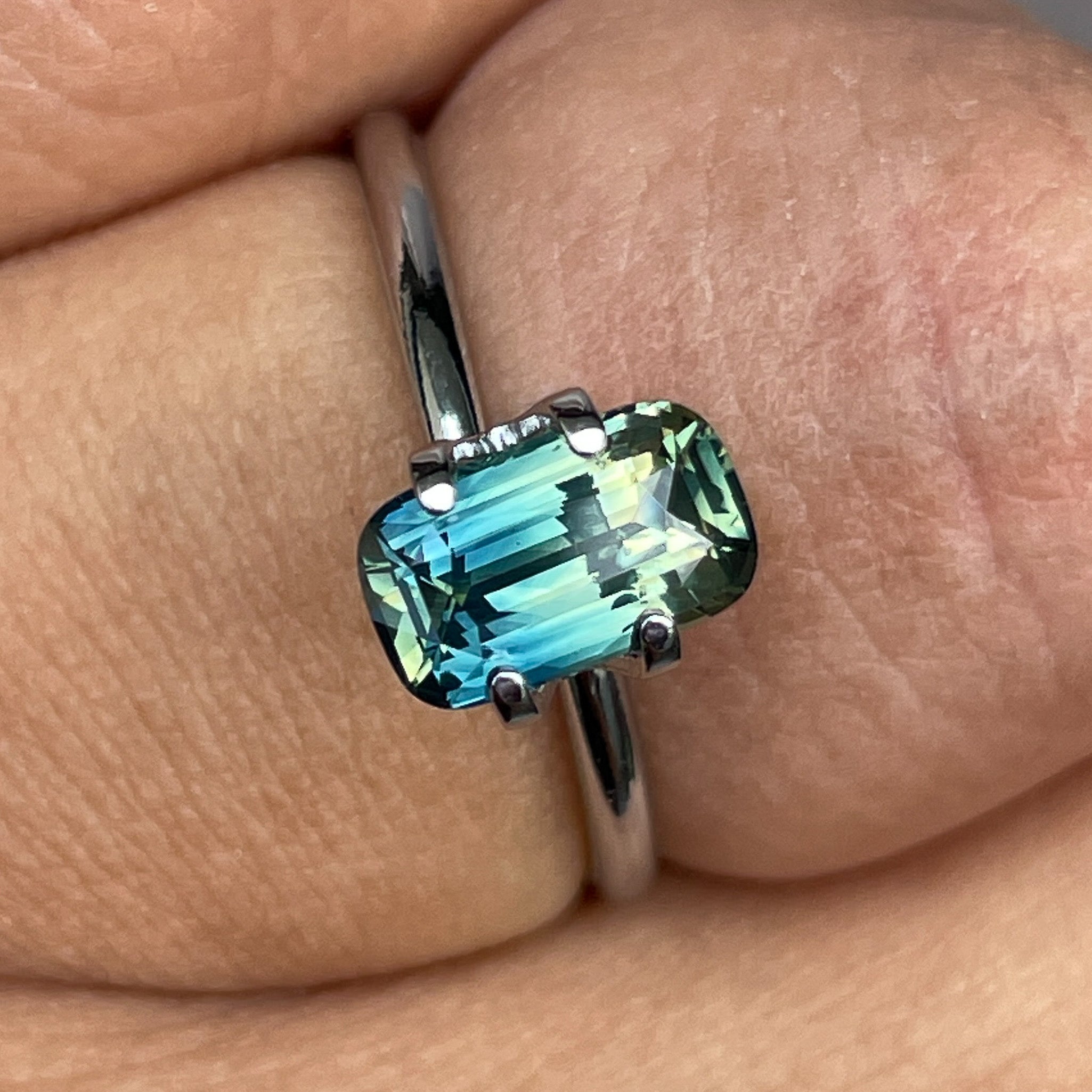 Teal natural Parti Bi Colour Sapphire 1.55 Ct elongated cushion cut loose gemstone by NASHGEMS, ideal for jewelry making.