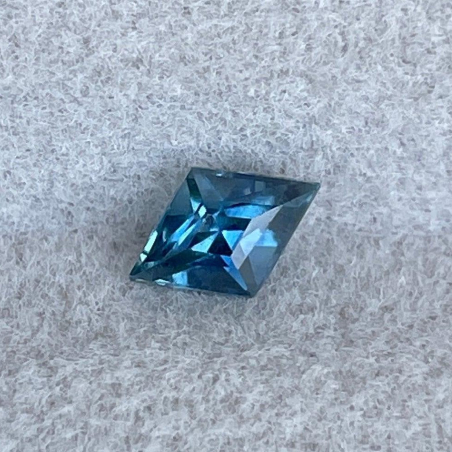 Bluish green sapphire, September birthstone, 0.45 carats, loose teal sapphire gemstone by NASHGEMS for jewelry setting.