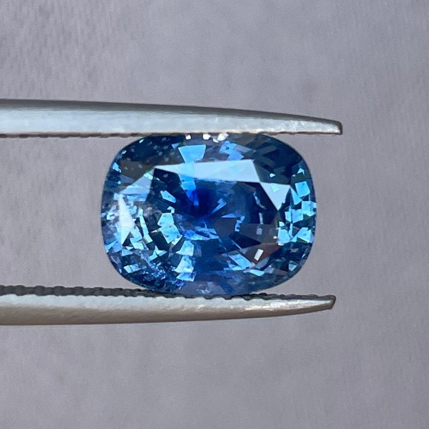 Natural earth-mined blue sapphire gemstone, 3.16 carats, showcasing deep blue color and clarity, ideal for jewelry from NASHGEMS.