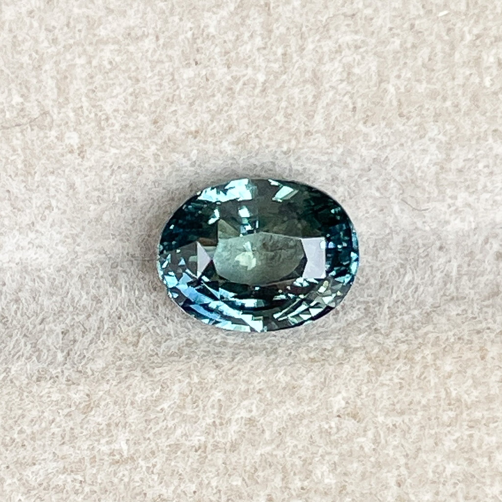 Natural teal blue-green sapphire loose gemstone, 2.03 Ct oval cut for engagement rings or custom jewelry by NASHGEMS.