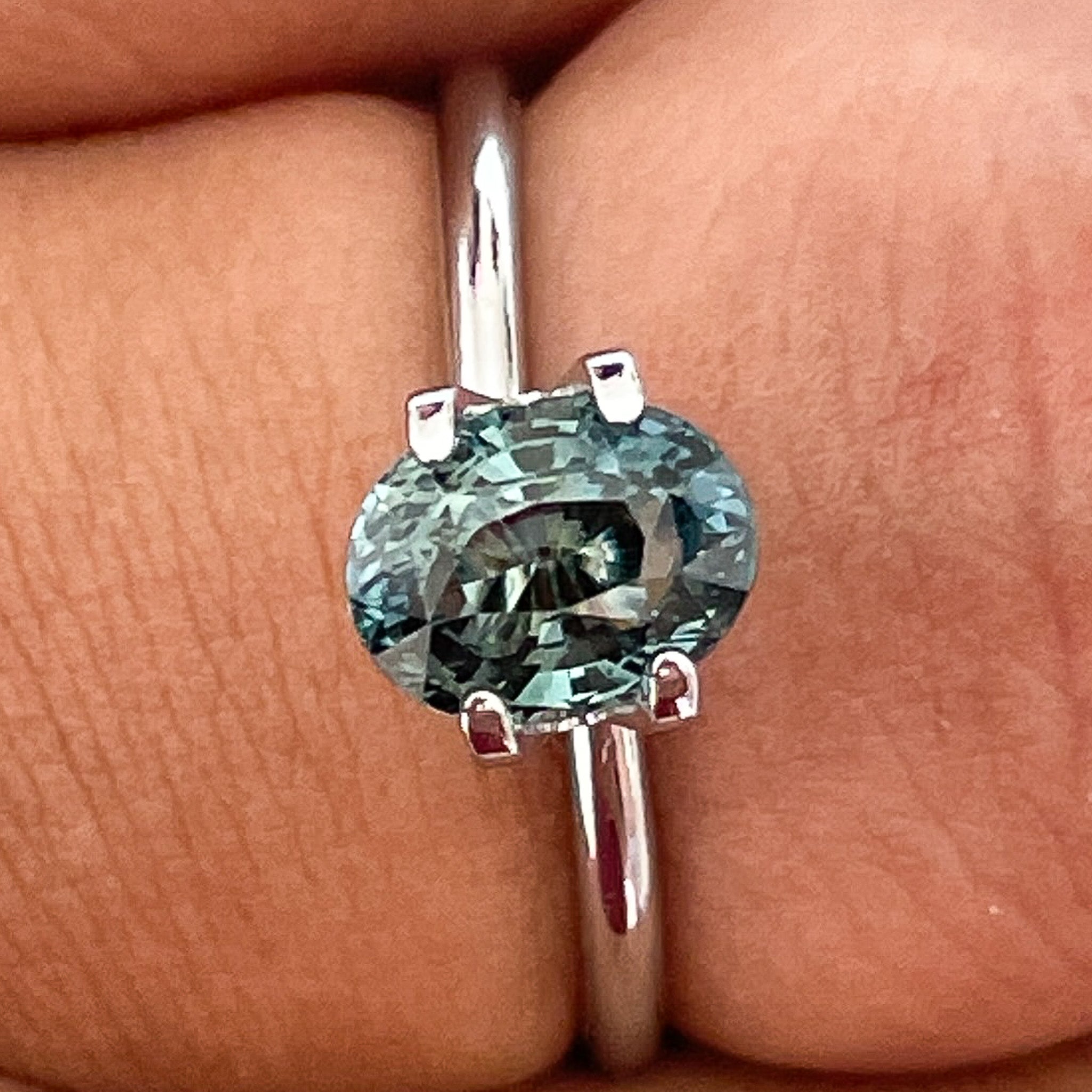 Natural teal blue-green sapphire, 2.03 Ct oval cut loose gemstone by NASHGEMS for engagement or custom jewelry.