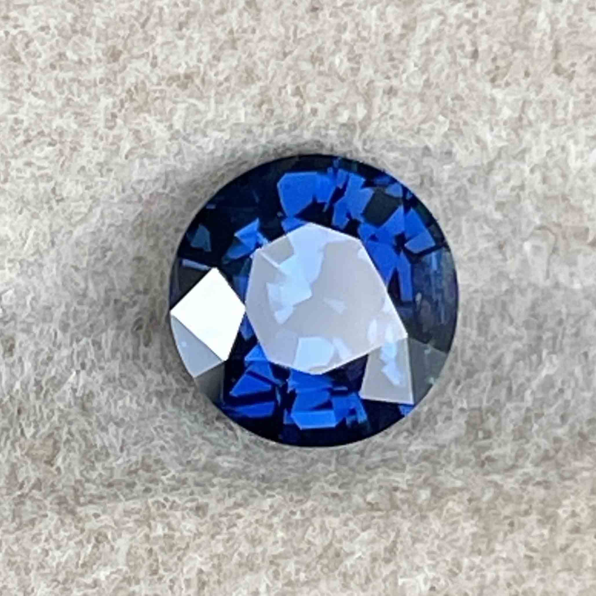 Natural blue sapphire 1.16 Ct round cut loose gemstone by NASHGEMS, heat-treated for engagement or custom jewelry.