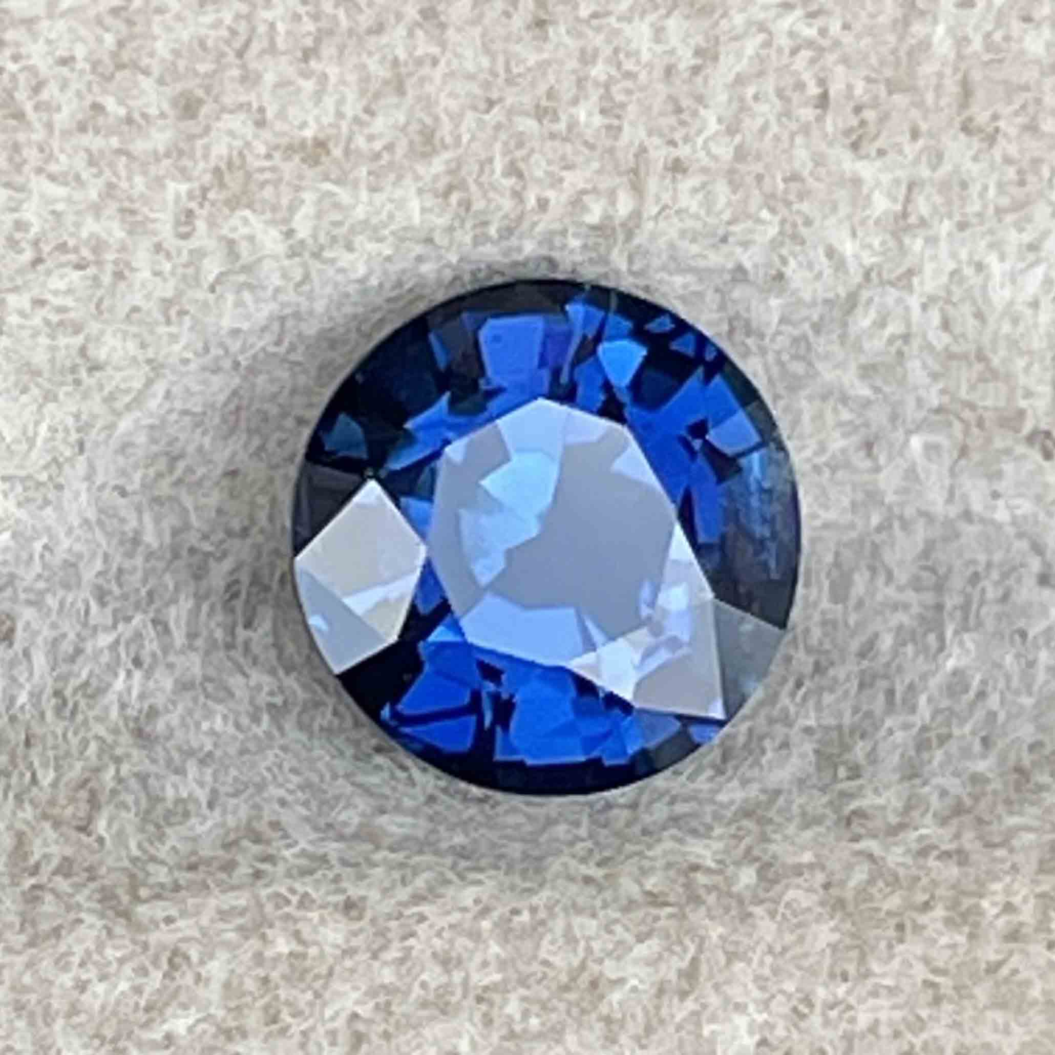 Natural blue sapphire 1.16 carats, round cut, heat-treated loose gemstone by NASHGEMS for engagement or custom jewelry.