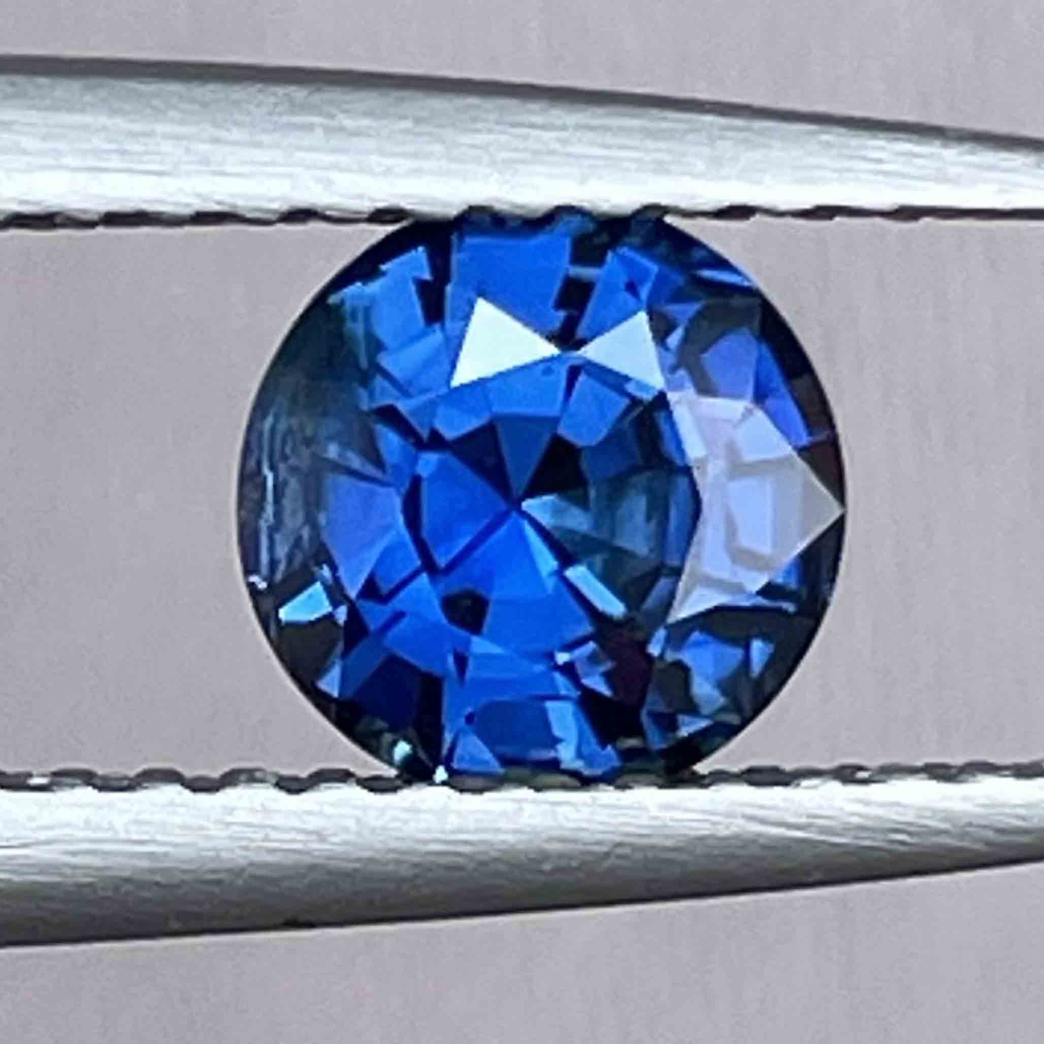 Natural 1.16 Ct blue sapphire loose gemstone, round cut and heat treated, ideal for engagement rings or custom jewelry by NASHGEMS.
