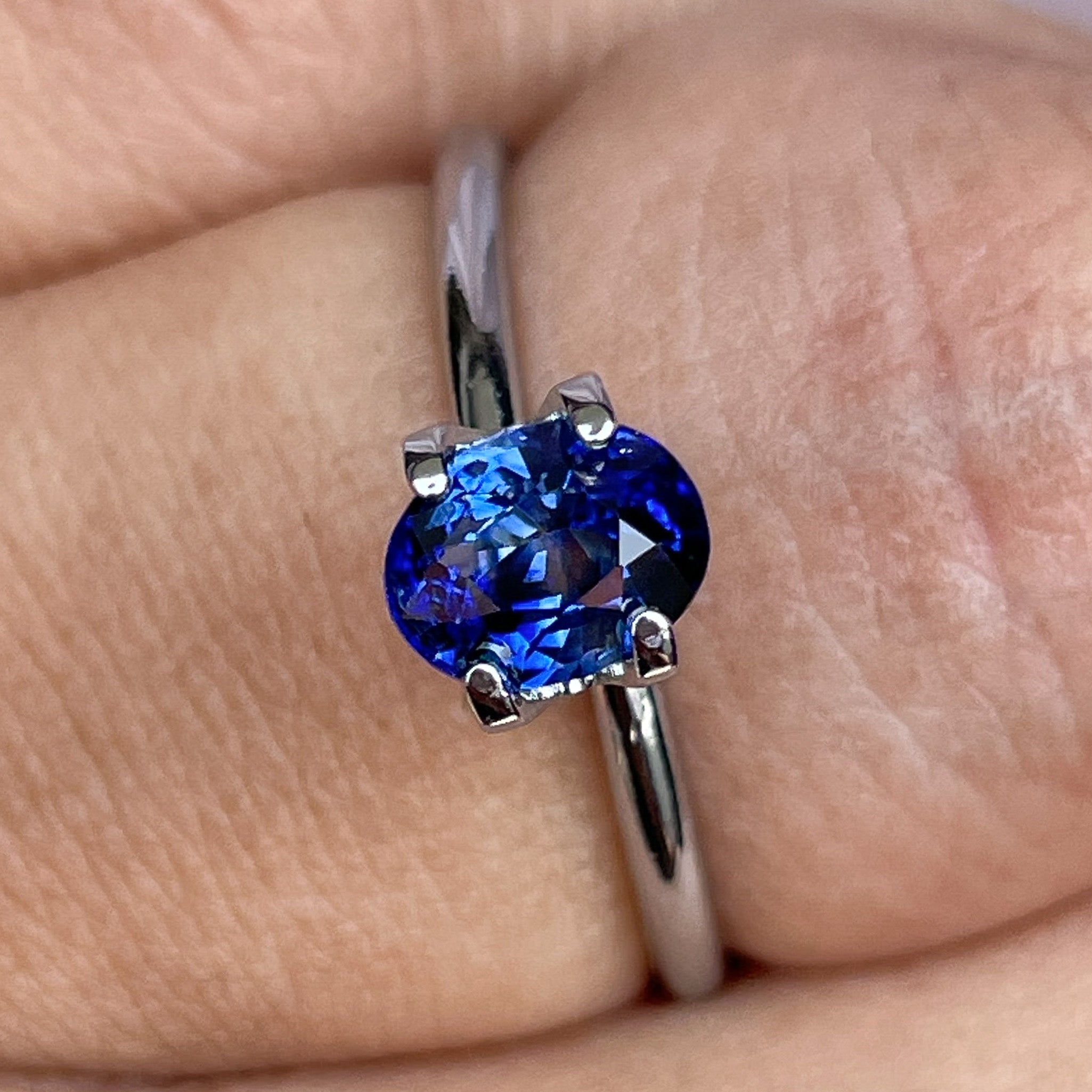 Oval cut natural Ceylon blue sapphire, 1.08 Ct, heat treated loose gemstone by NASHGEMS for engagement or custom jewelry.