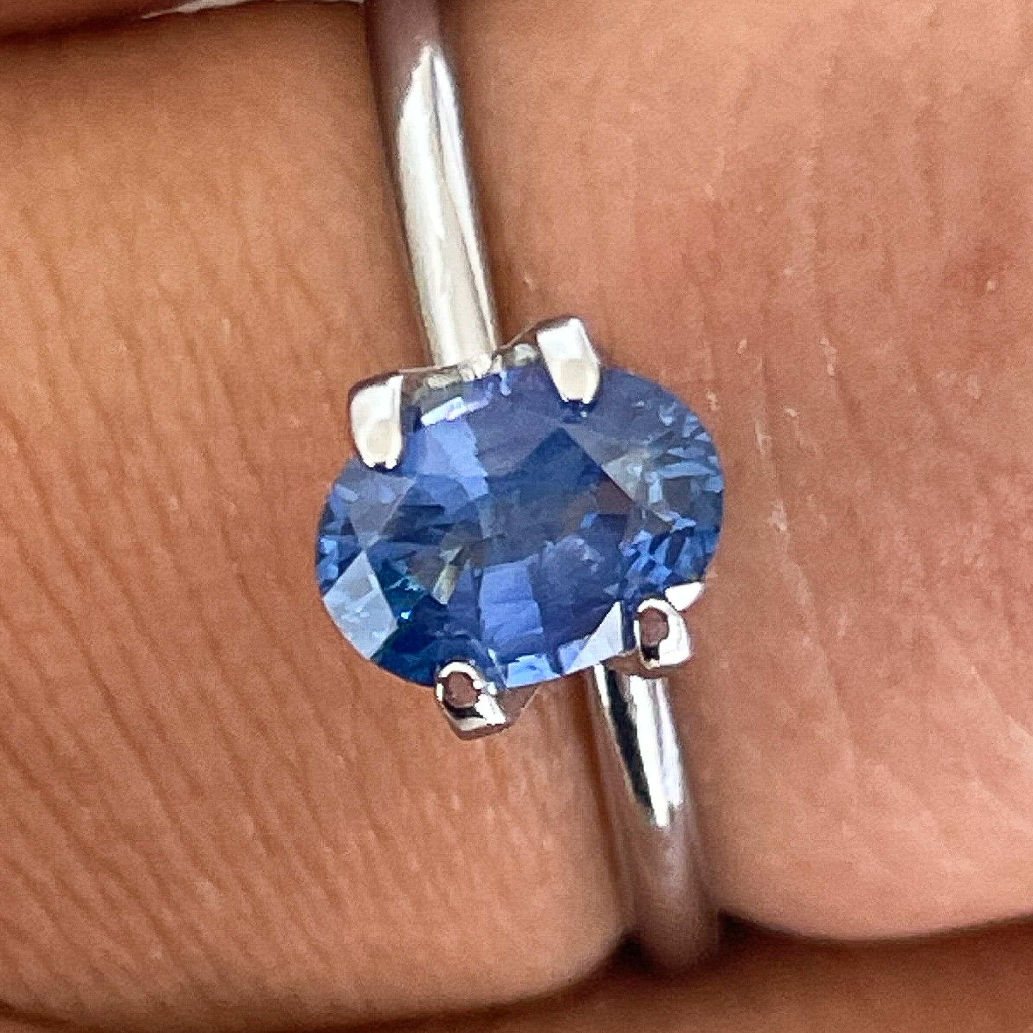 Natural Ceylon Blue Sapphire 0.97 Ct oval cut loose gemstone by NASHGEMS, perfect for engagement rings.