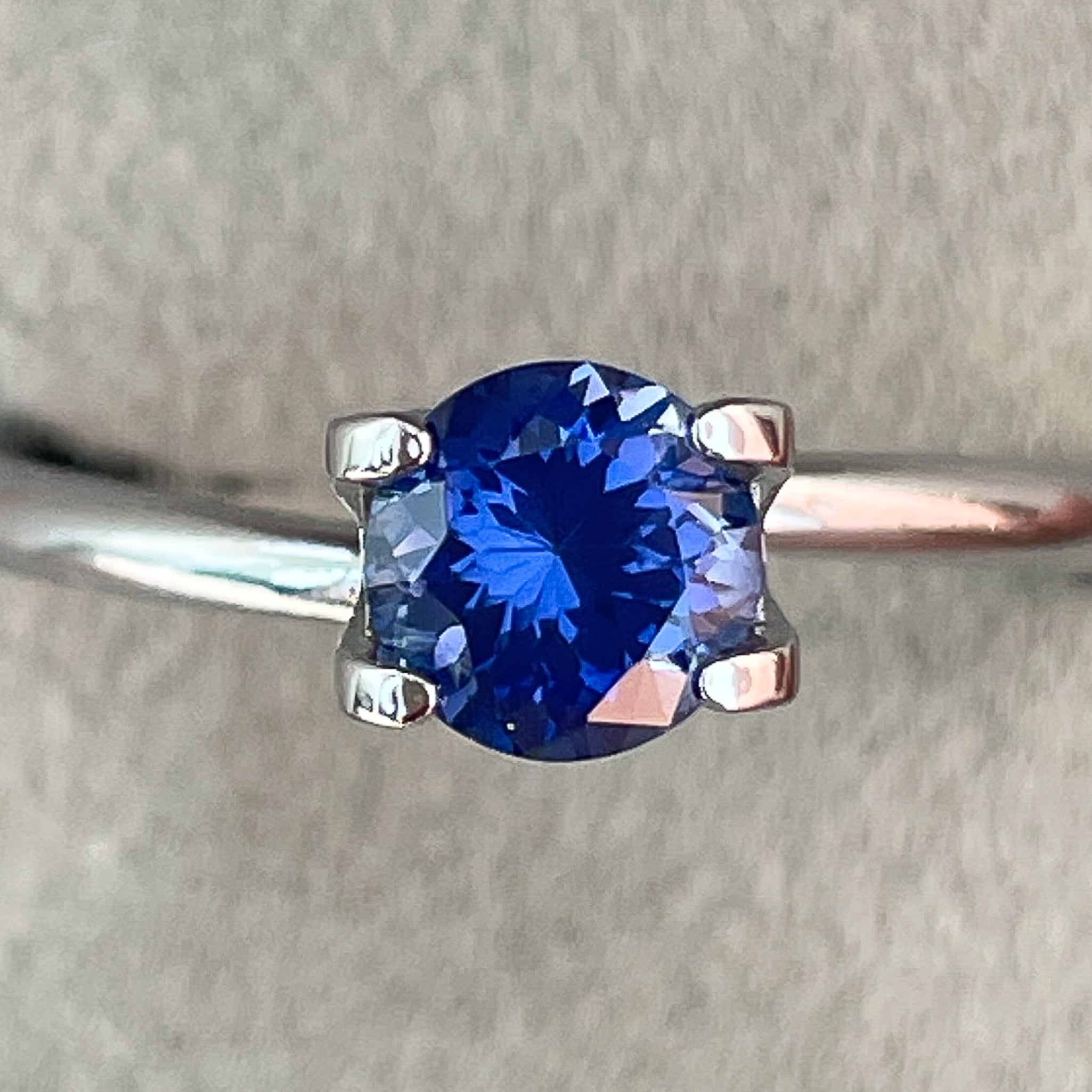 Natural Ceylon Blue Sapphire 0.80 Ct round cut VVS loose gemstone from NASHGEMS, ideal for engagement rings.